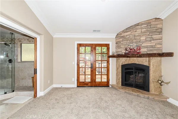 a kitchen with a stove and a refrigerator