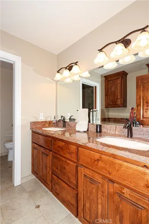a street view with wooden fence and trees