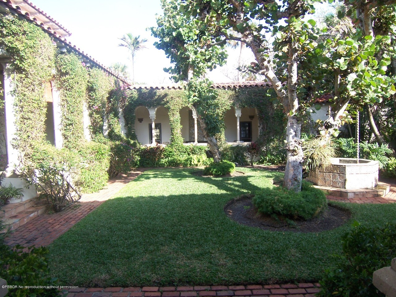 79 Middle Road Palm Beach, FL 33480 - Photo 13 of 24 a front view of a house with garden