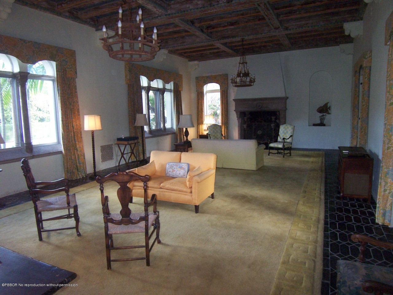 79 Middle Road Palm Beach, FL 33480 - Photo 17 of 24 a building outdoor space with patio furniture and a fireplace