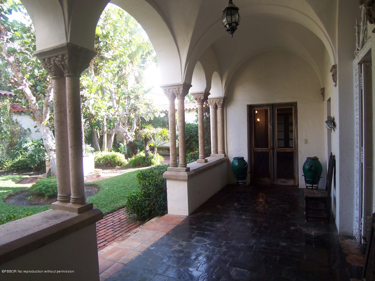 79 Middle Road Palm Beach, FL 33480 - Photo 10 of 24 a front view of a house with a yard