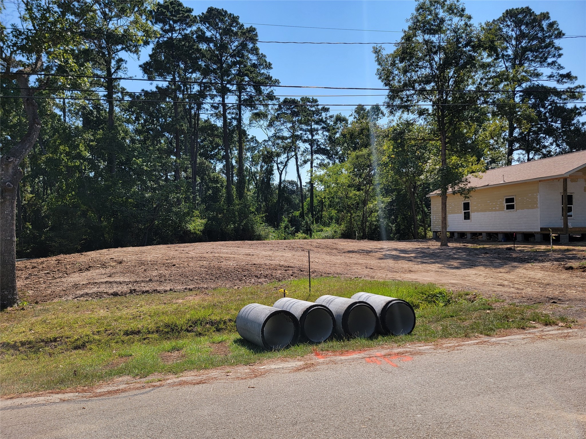 0 Springwater Drive Huffman, TX 77336 - Photo 15 of 17 a view of a swimming pool with a yard