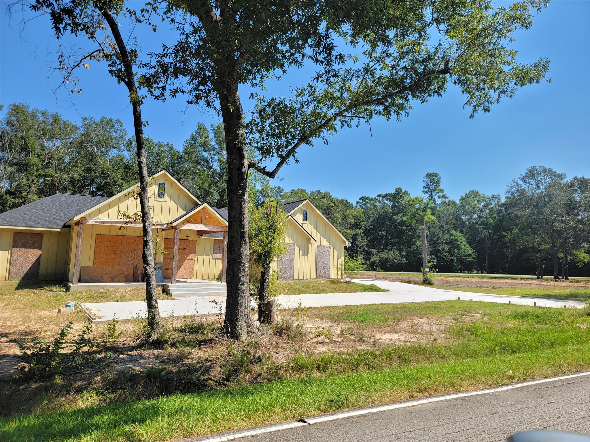 0 Springwater Drive Huffman, TX 77336 - Photo 16 of 17 a view of a house with a yard