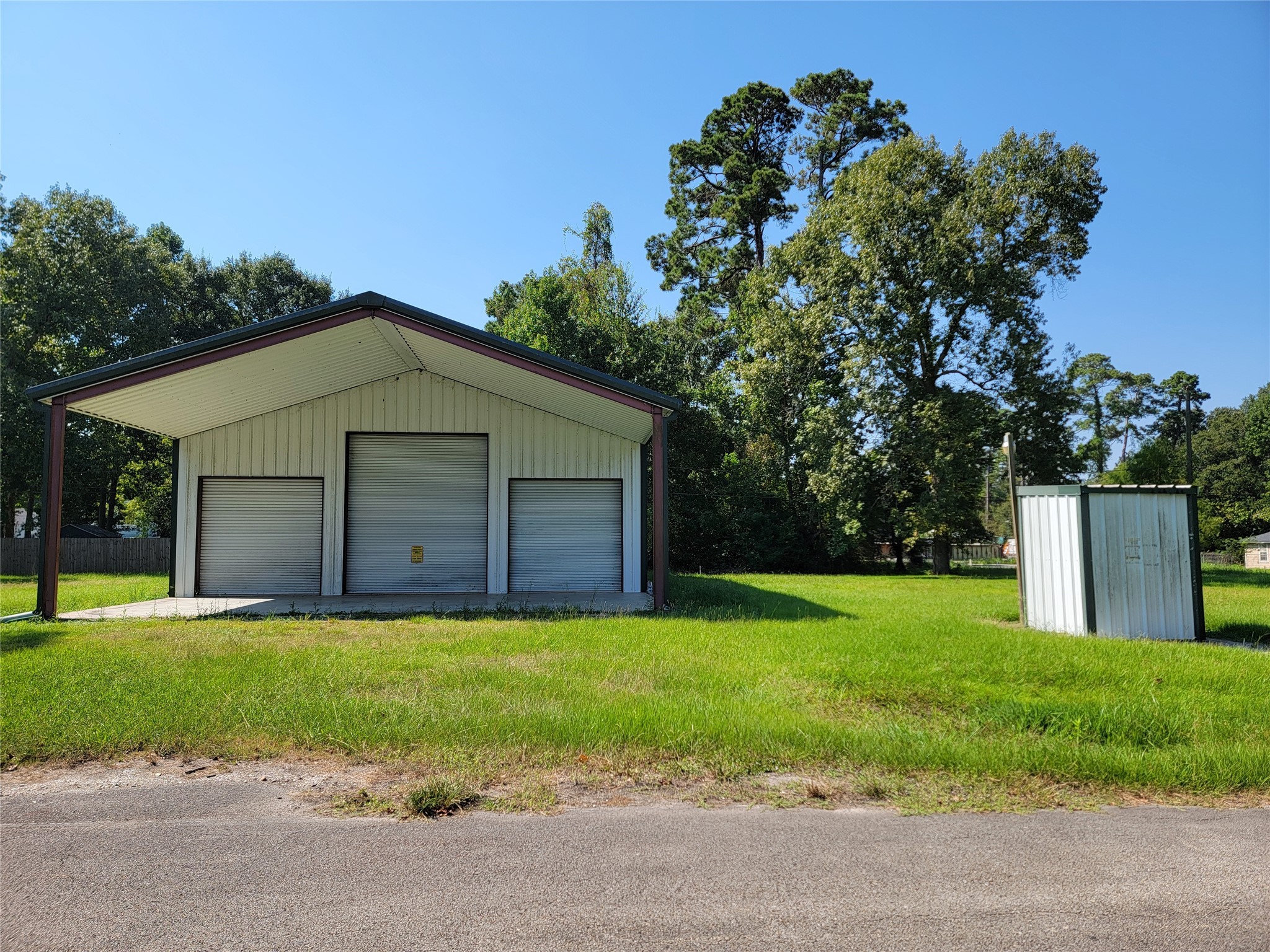 0 Springwater Drive Huffman, TX 77336 - Photo 8 of 17 a front view of house with yard and green space