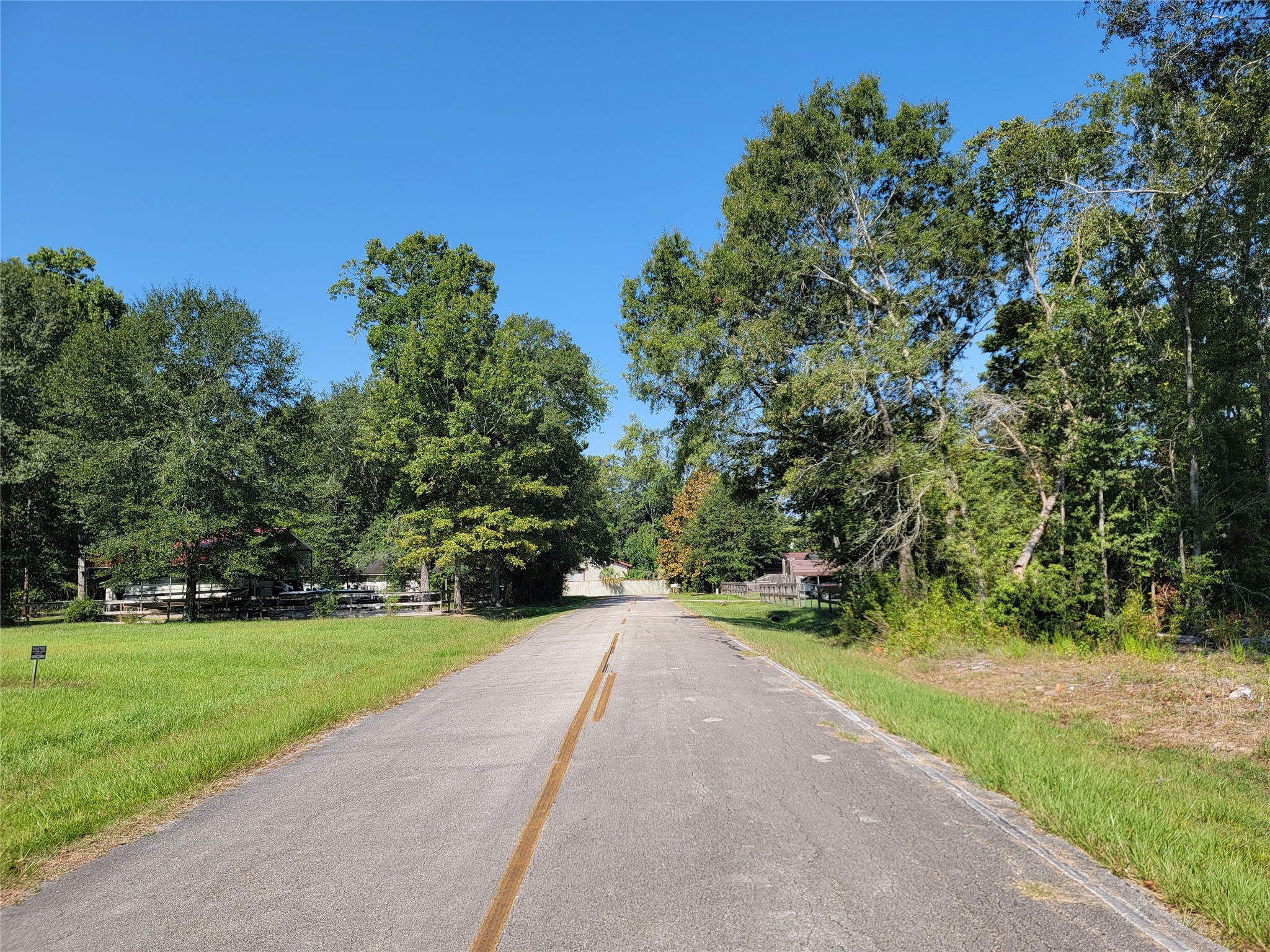 0 Springwater Drive Huffman, TX 77336 - Photo 10 of 17 a view of a road with a yard