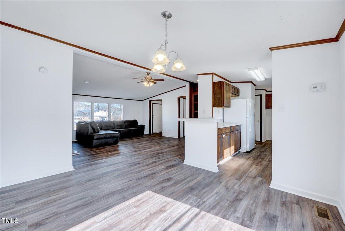 56 Jefferson Lane Cameron, NC 28326 - Photo 9 of 38 a living room with furniture and kitchen view