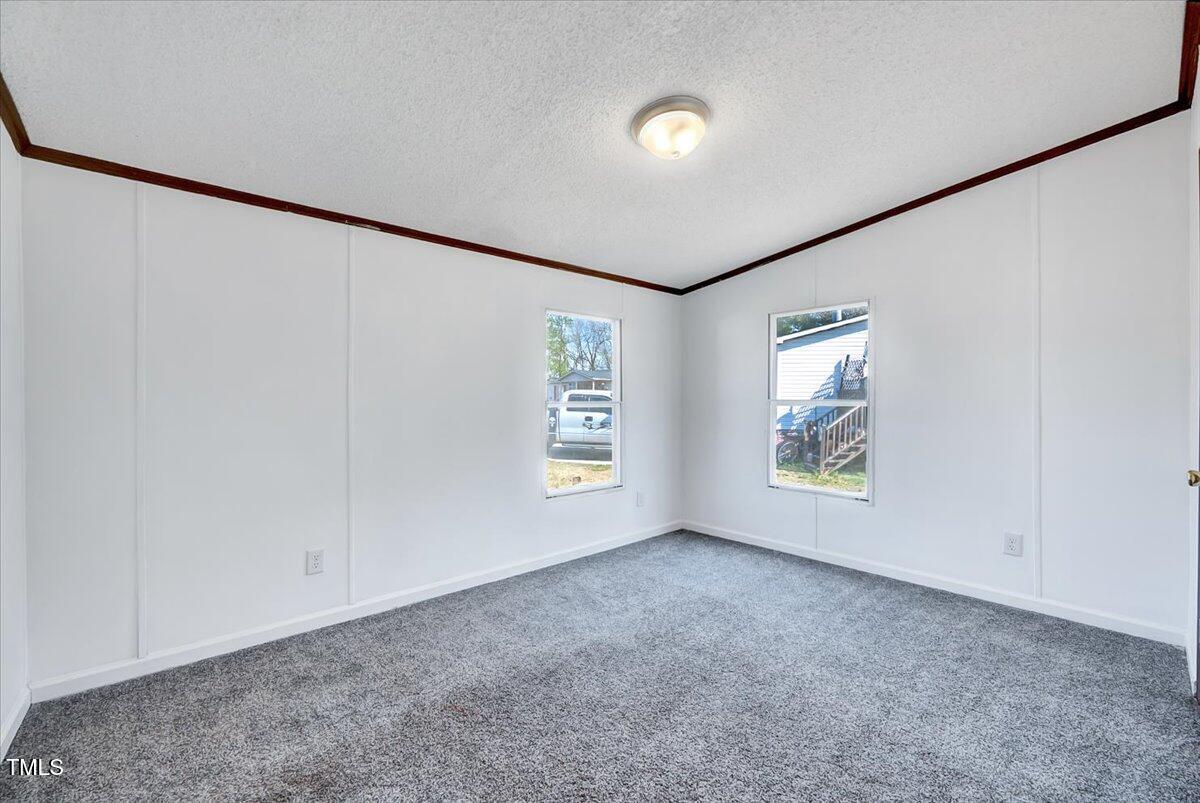 56 Jefferson Lane Cameron, NC 28326 - Photo 25 of 38 an empty room with windows