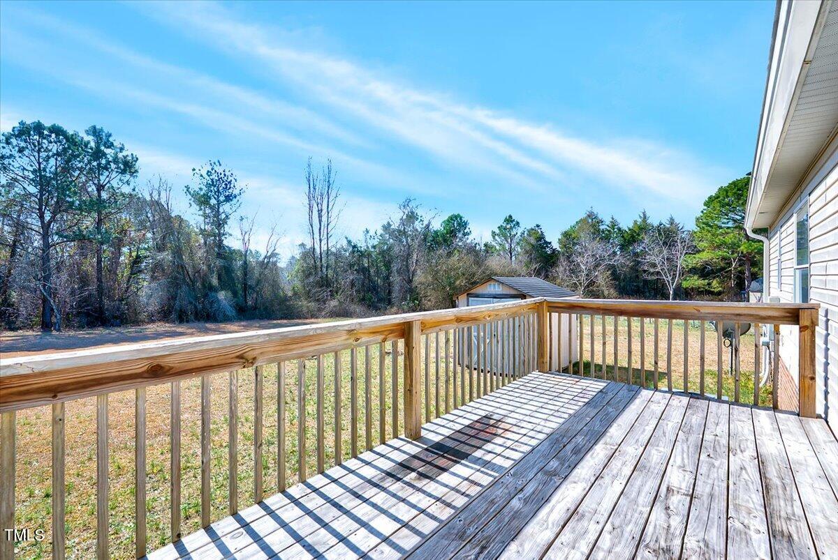 56 Jefferson Lane Cameron, NC 28326 - Photo 29 of 38 a balcony with wooden floor and fence
