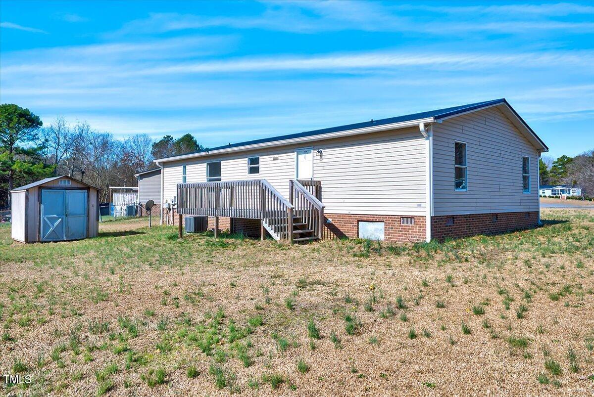 56 Jefferson Lane Cameron, NC 28326 - Photo 31 of 38 a house view with a backyard space