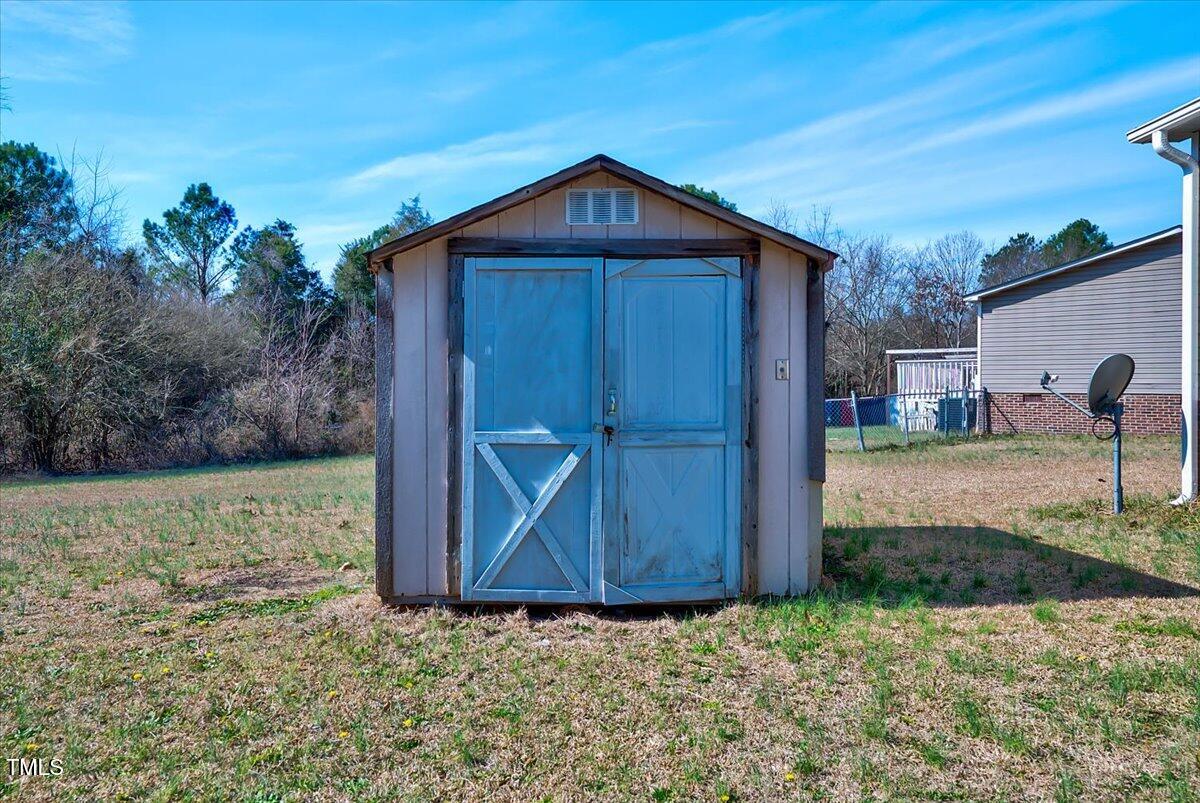 56 Jefferson Lane Cameron, NC 28326 - Photo 33 of 38 a front view of a house with garden