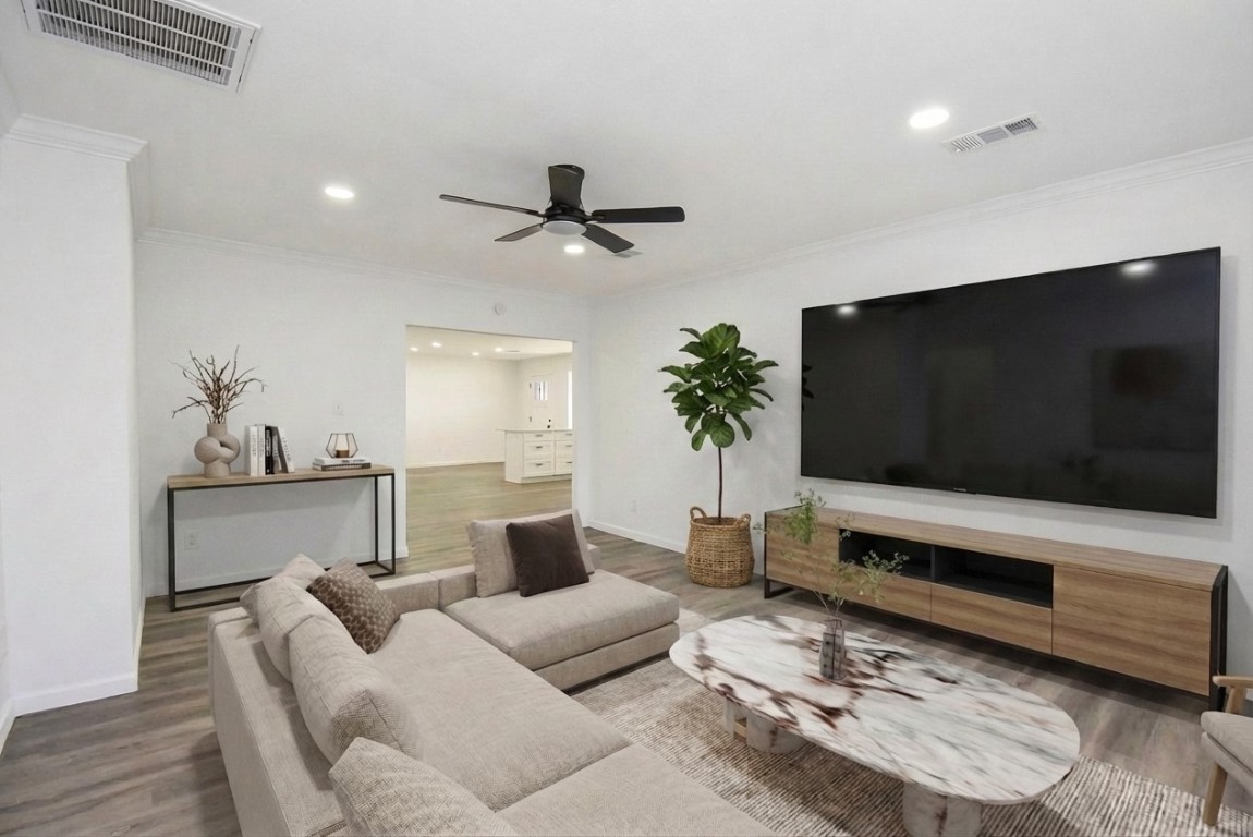 514 Peach Spring Drive Houston, TX 77037 - Photo 10 of 27 a living room with furniture and a flat screen tv