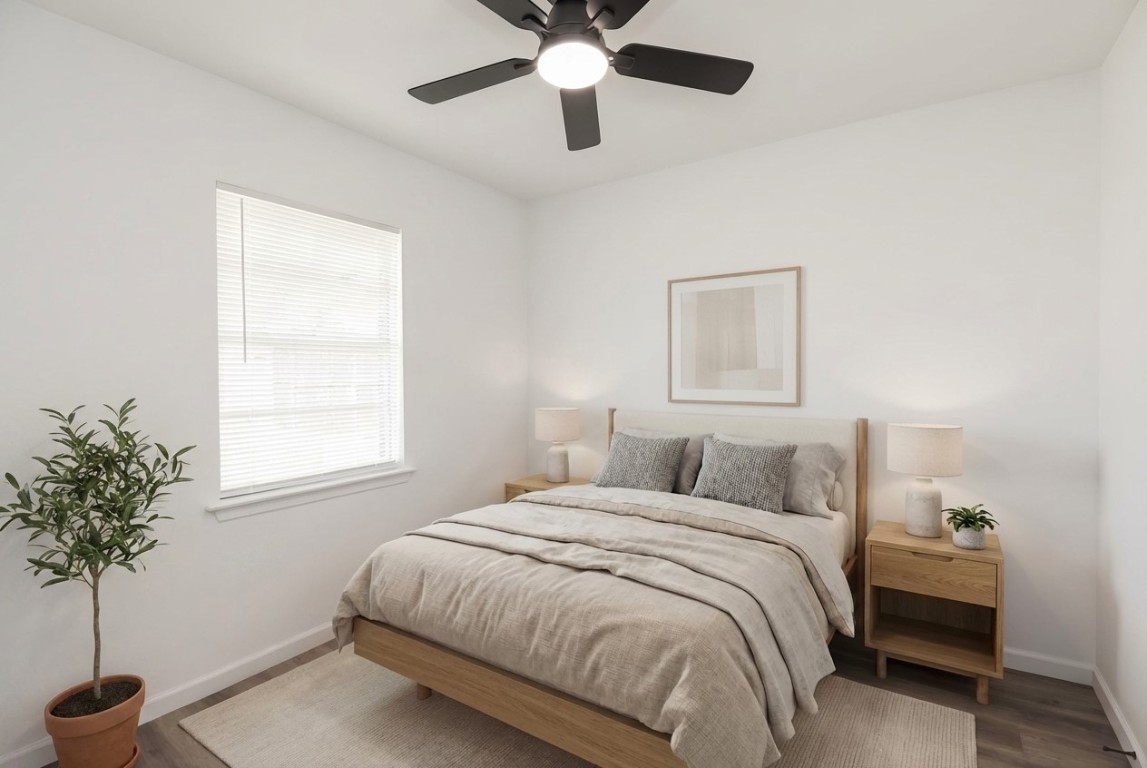 514 Peach Spring Drive Houston, TX 77037 - Photo 20 of 27 a bedroom with bed and a window