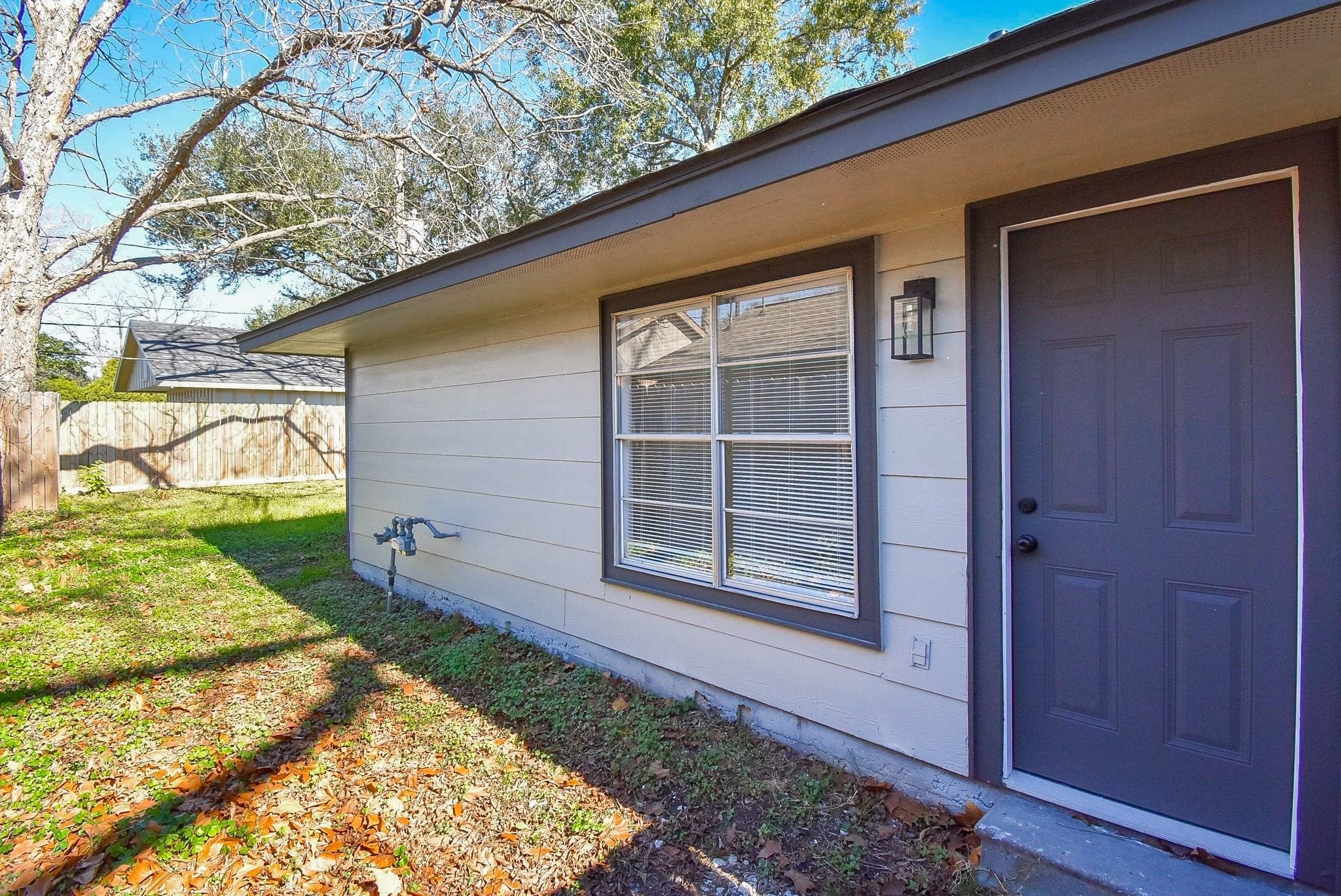 514 Peach Spring Drive Houston, TX 77037 - Photo 26 of 27 a front view of a house with a yard