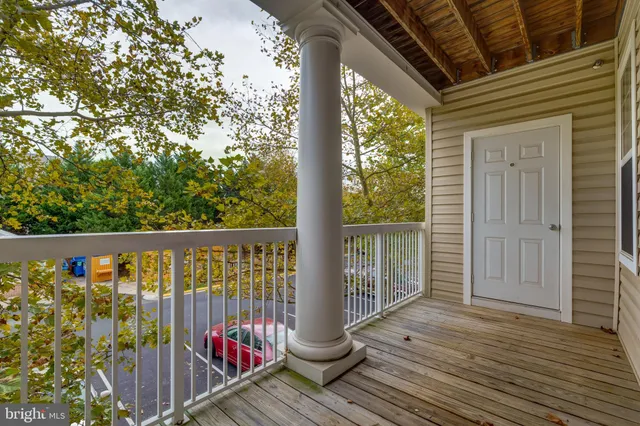 a view of balcony with furniture