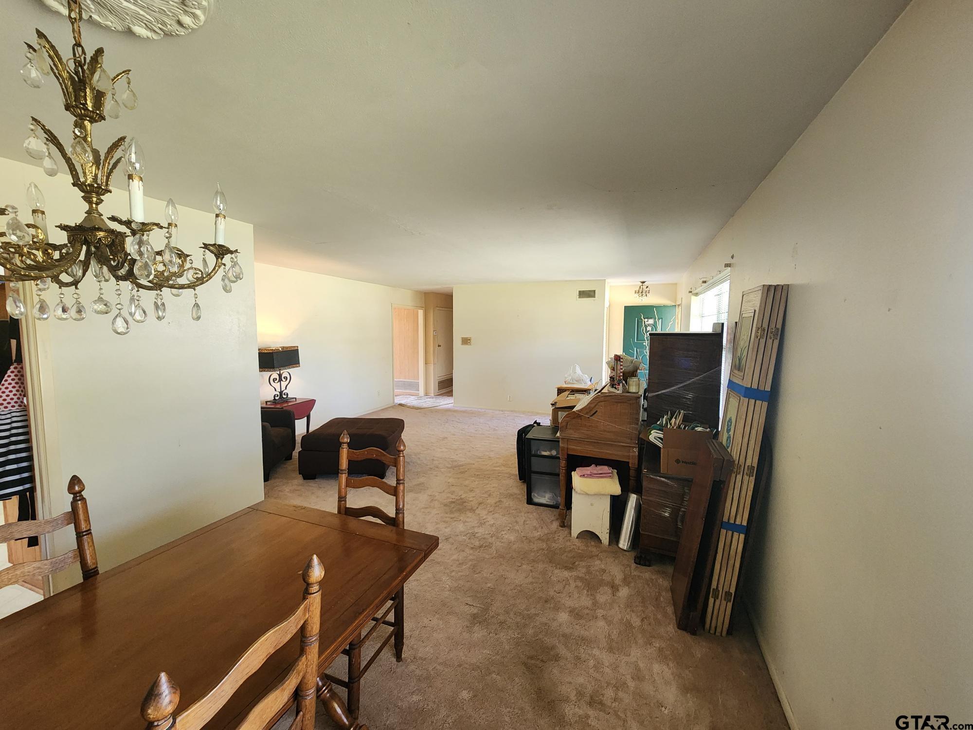 512 E Lane Quitman, TX 75783 - Photo 13 of 32 a view of a workspace with furniture