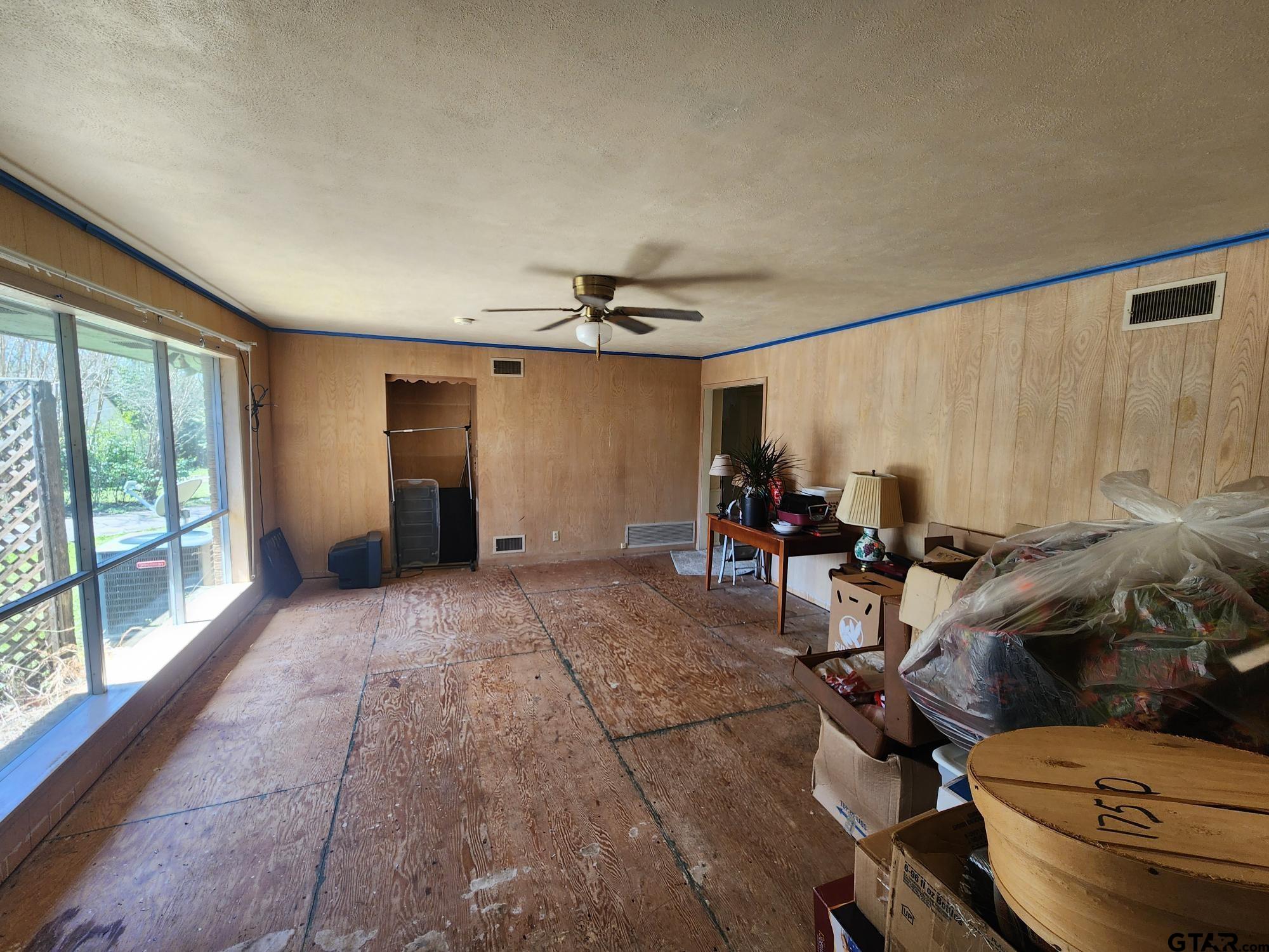 512 E Lane Quitman, TX 75783 - Photo 14 of 32 a view of a livingroom with furniture and windows