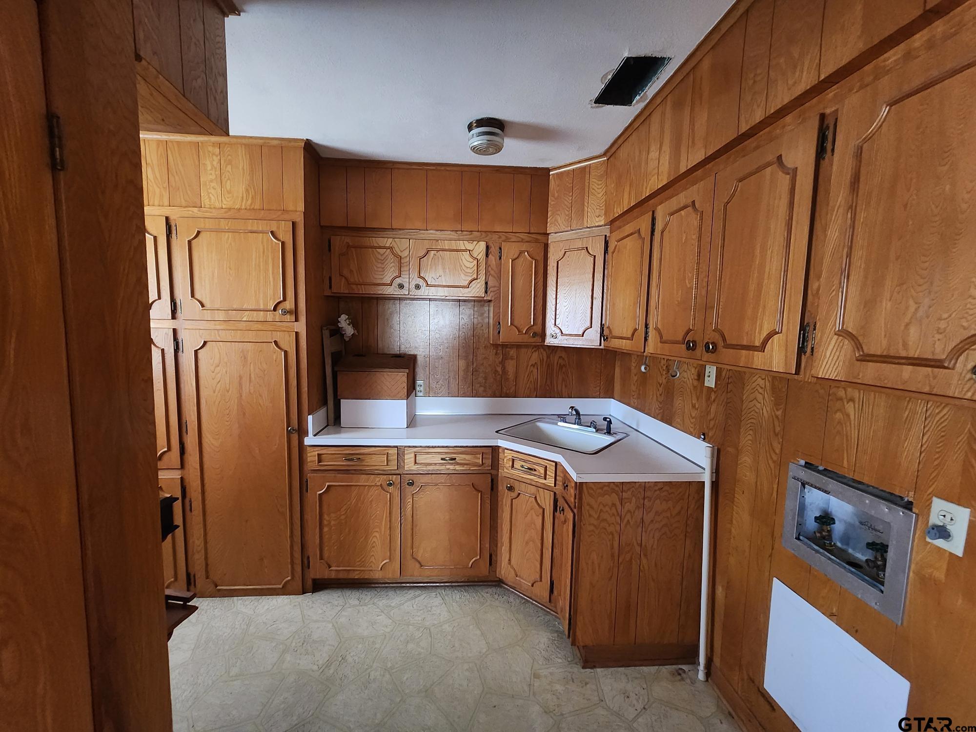 512 E Lane Quitman, TX 75783 - Photo 16 of 32 a utility room with dryer and washer