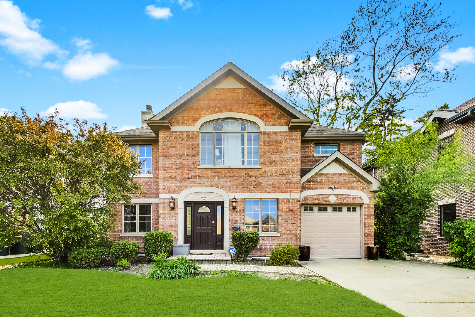 721 Oriole Avenue Park Ridge, IL 60068 - Photo 1 of 42 a front view of a house with garden