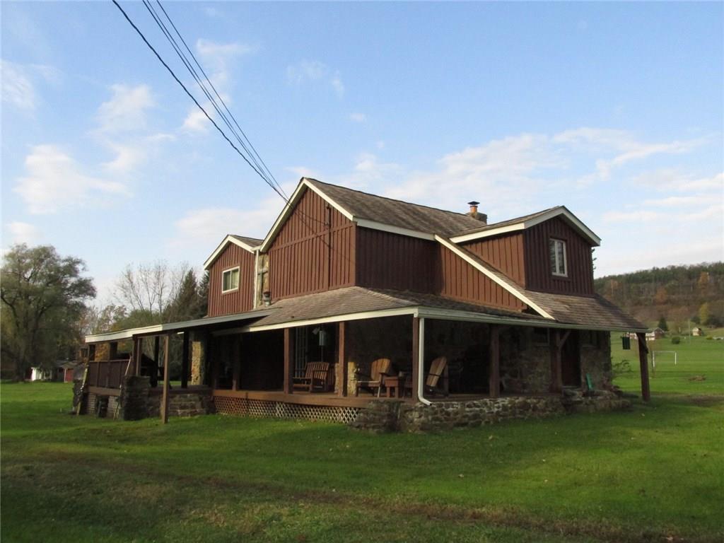 Walk to Indian Creek for great fishing!! The Indian Creek 10 mile trail for hiking and biking is on the other side!  Currently the property is set up as a duplex with 2 private entries. Let's take a look at the front side first.