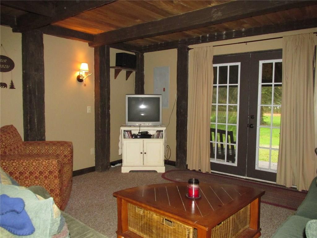 126 Nebo Road Champion, PA 15622 - Photo 3 of 25 Other side of the living room. The door opens out to the deck and side yard.