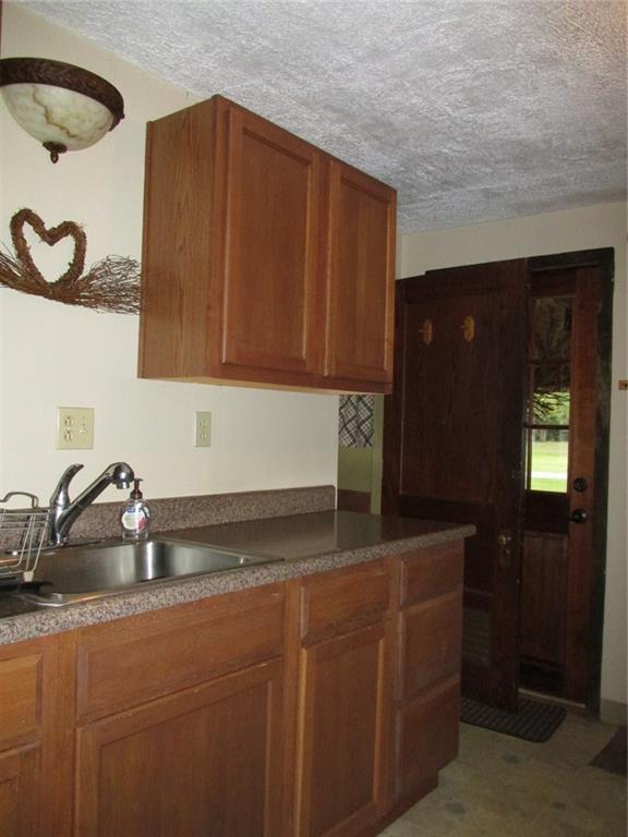 126 Nebo Road Champion, PA 15622 - Photo 6 of 25 To the back left is the full bath room.