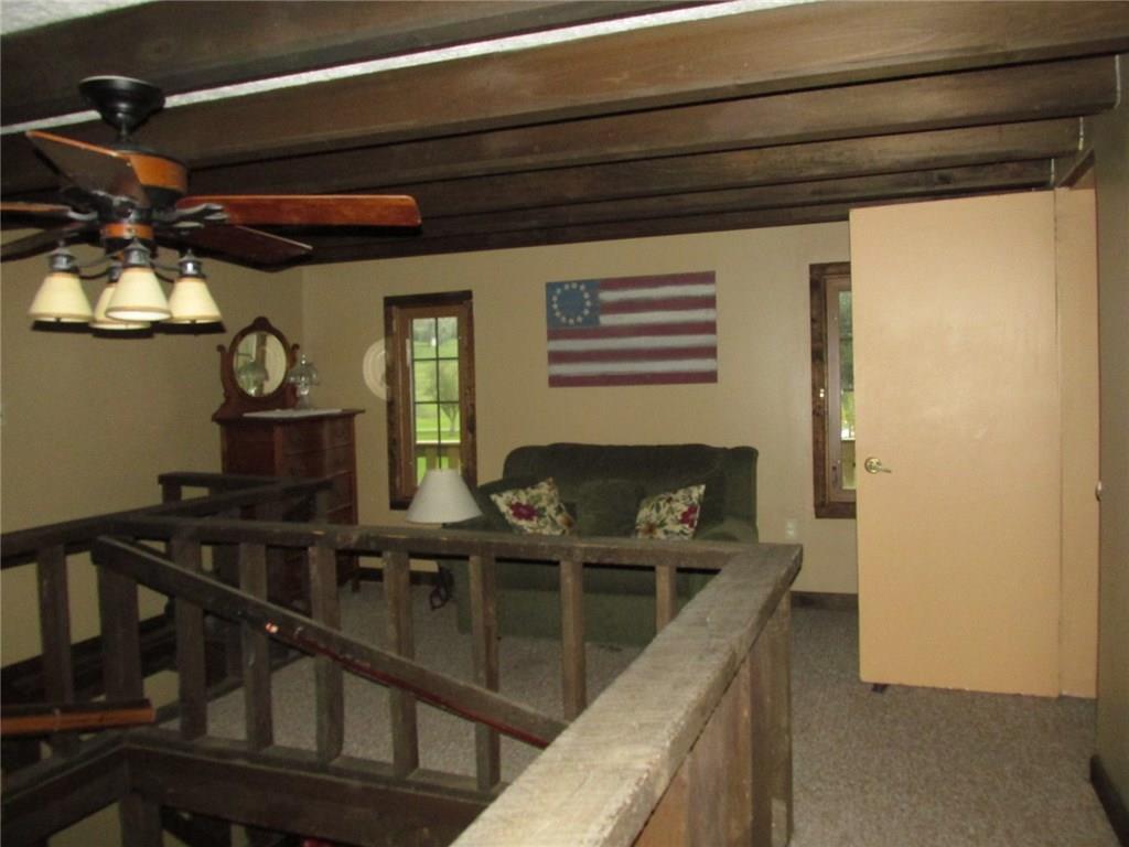 126 Nebo Road Champion, PA 15622 - Photo 10 of 25 Other side of the loft area. The open door leads into the bedroom.