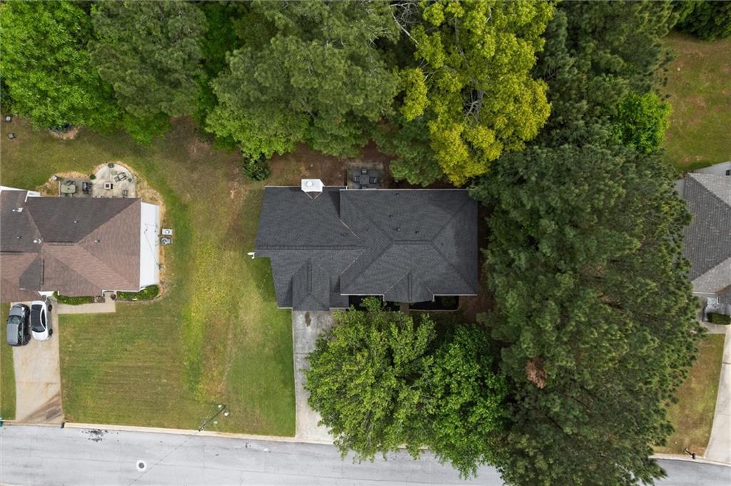 3234 Mineral Ridge Lane Stone Mountain, GA 30087 - Photo 50 of 55 an aerial view of a house with a yard