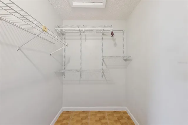a view of a room with racks on the wall