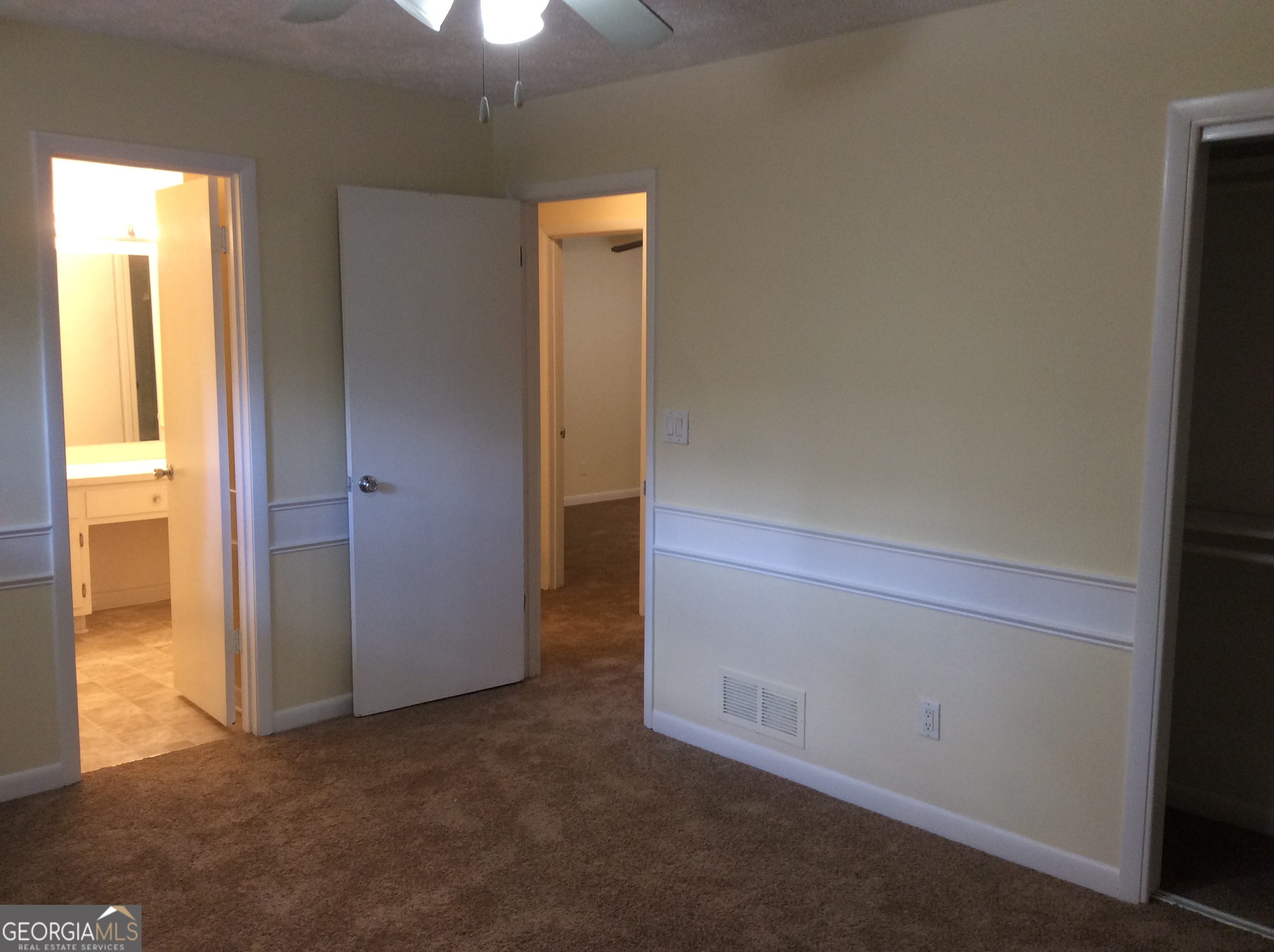 5022 Rock Springs Road Lithonia, GA 30038 - Photo 16 of 35 an empty room with a bathroom