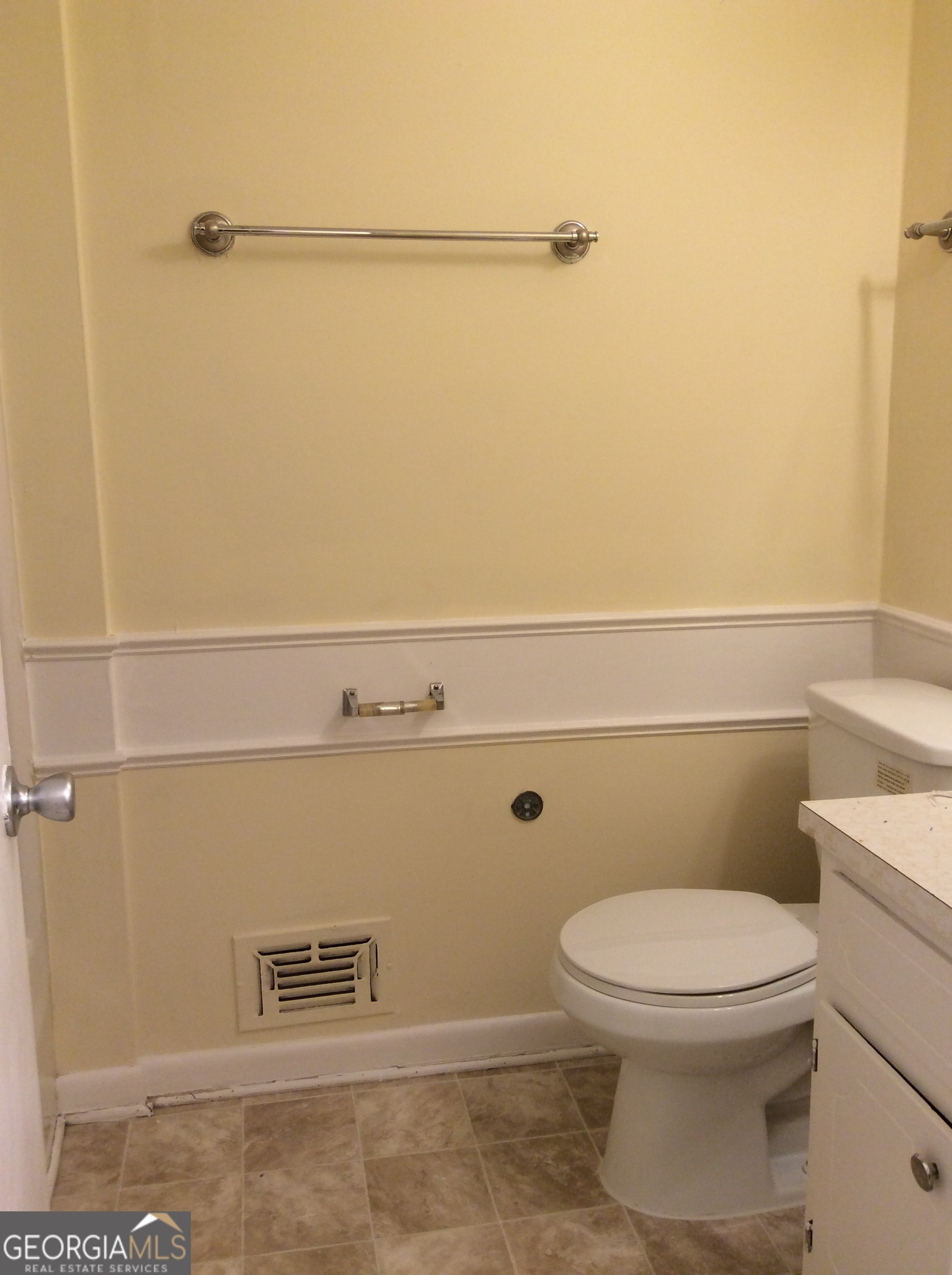 5022 Rock Springs Road Lithonia, GA 30038 - Photo 18 of 35 a bathroom with a toilet and a shower
