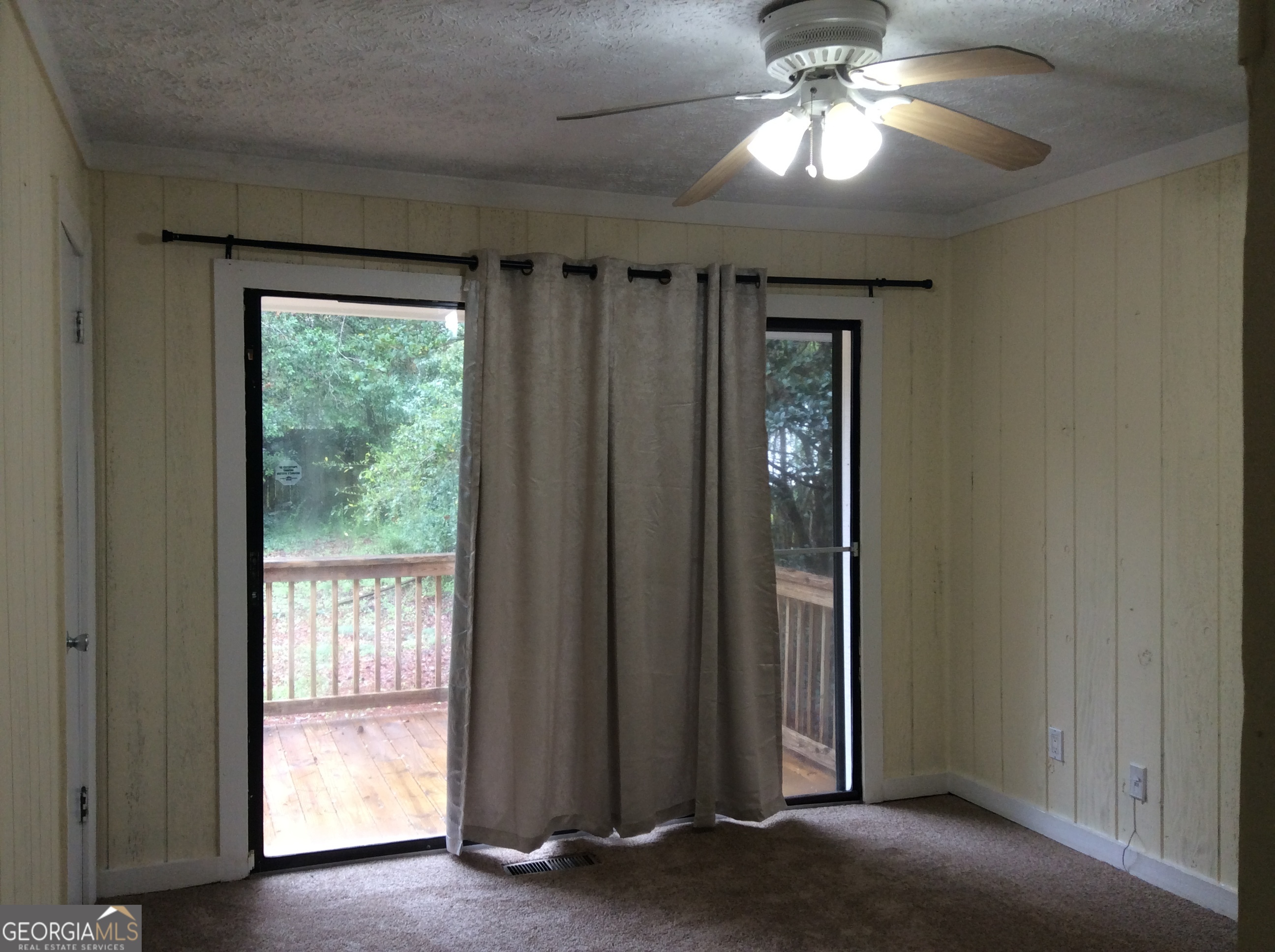 5022 Rock Springs Road Lithonia, GA 30038 - Photo 24 of 35 a view of a hallway with windows and chandelier