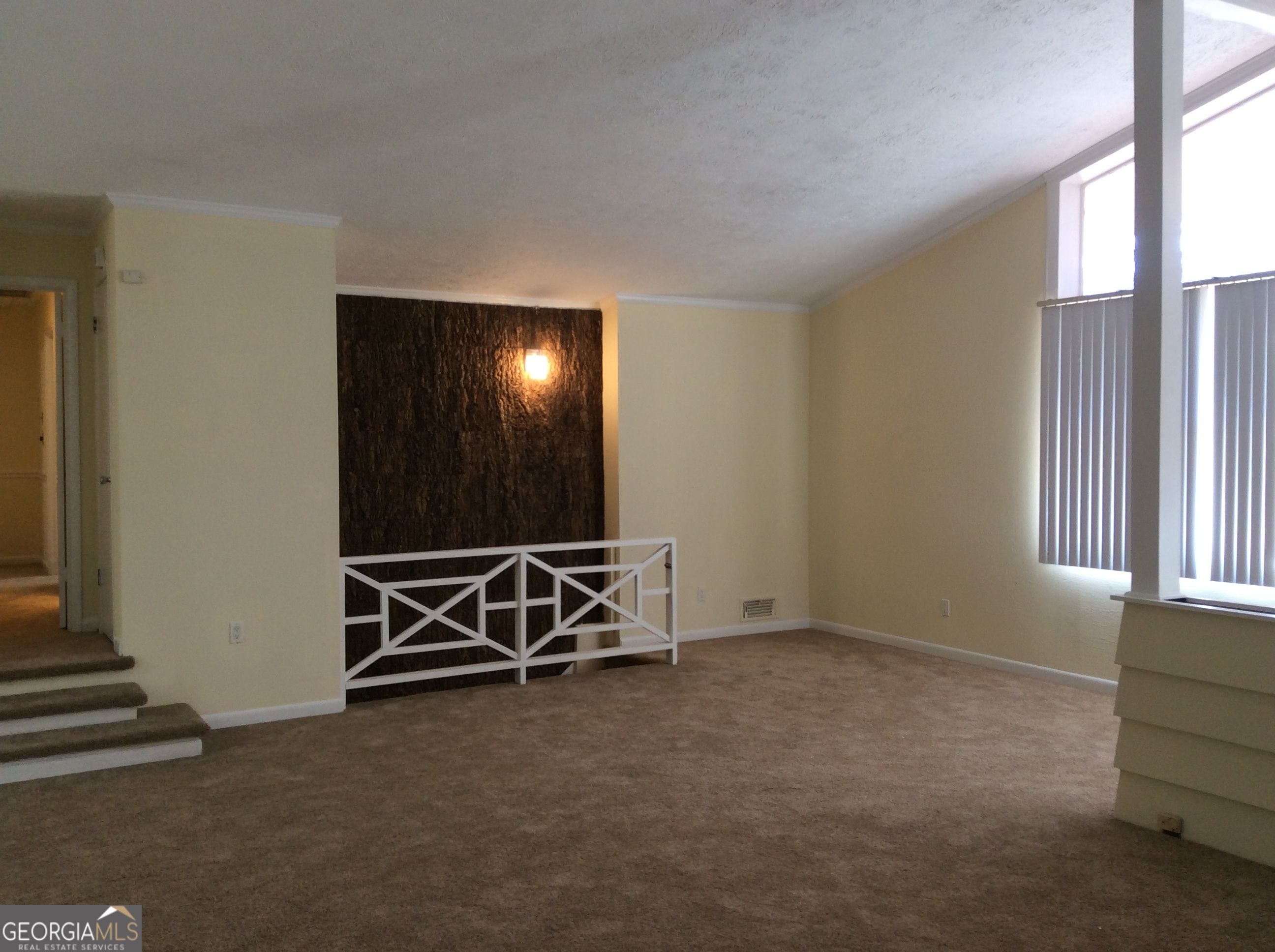 5022 Rock Springs Road Lithonia, GA 30038 - Photo 27 of 35 an empty room with windows