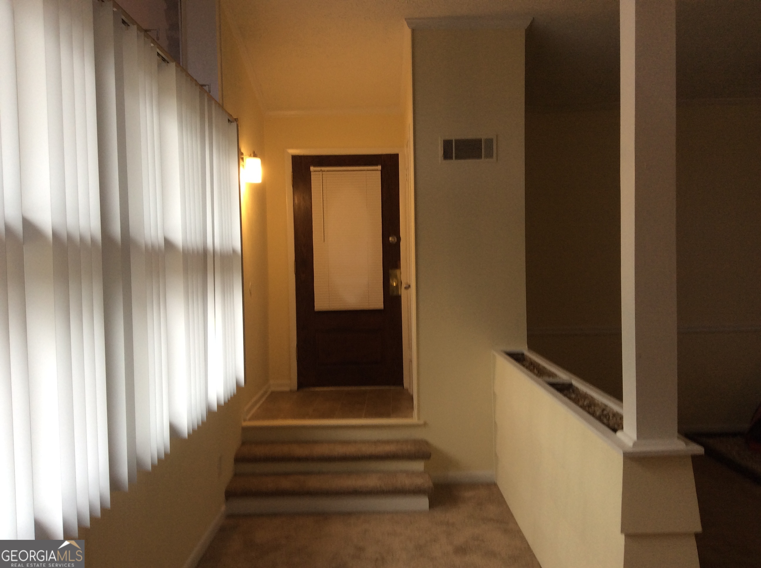 5022 Rock Springs Road Lithonia, GA 30038 - Photo 3 of 35 a view of a entryway with wooden floor