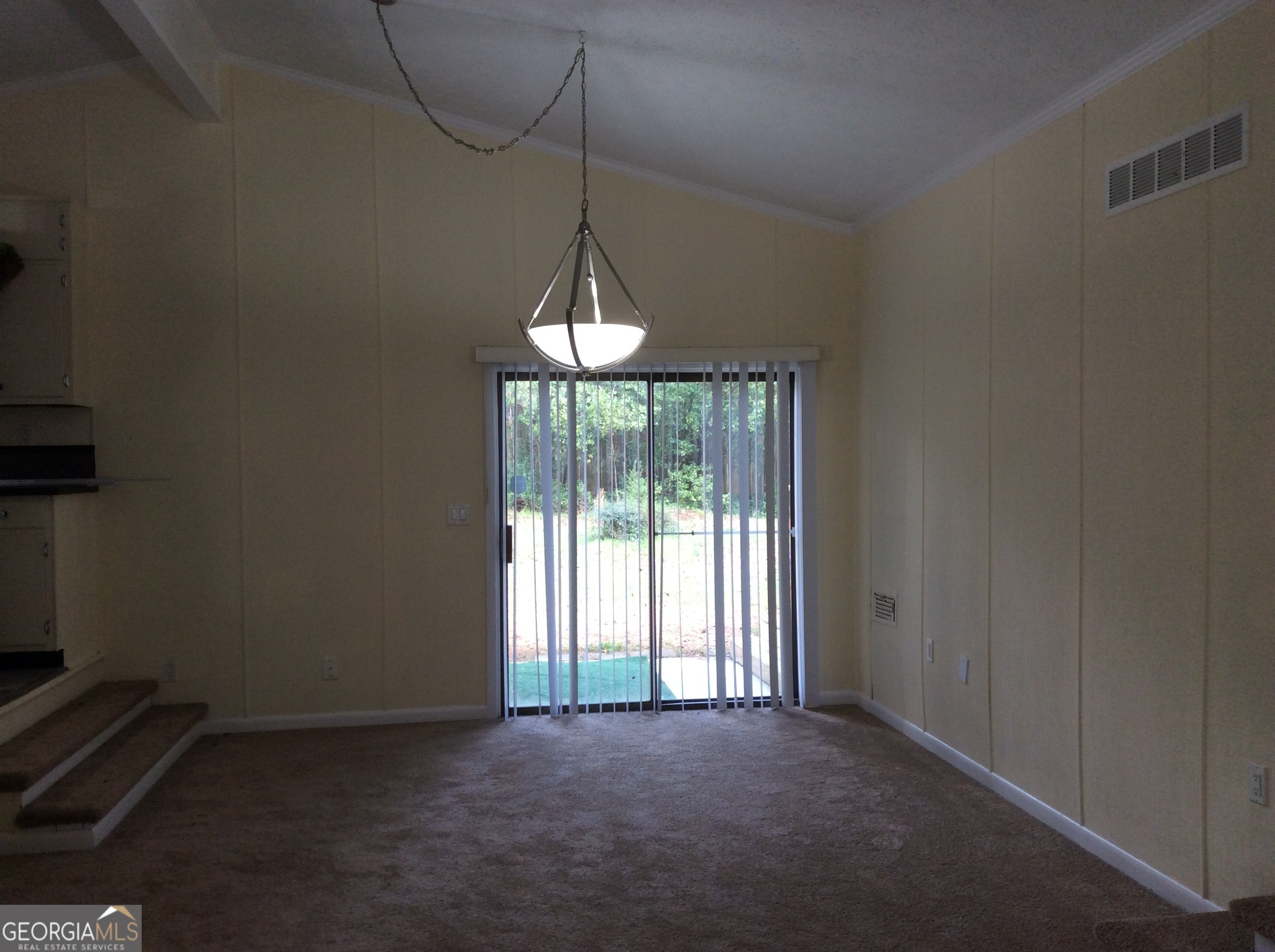 5022 Rock Springs Road Lithonia, GA 30038 - Photo 6 of 35 a view of an empty room with a window