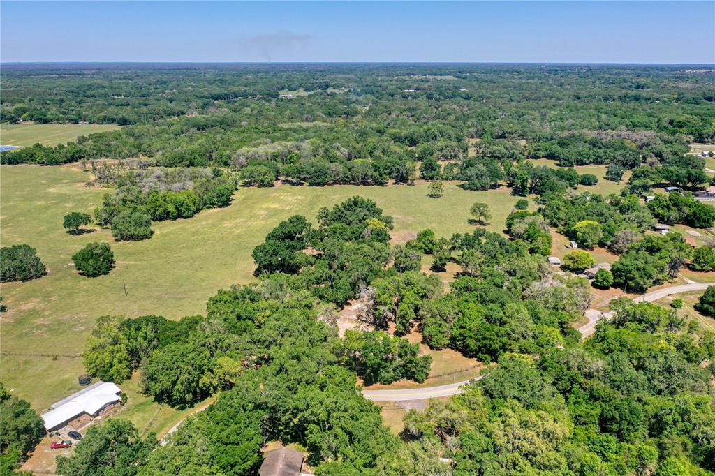 a view of a lake with a yard