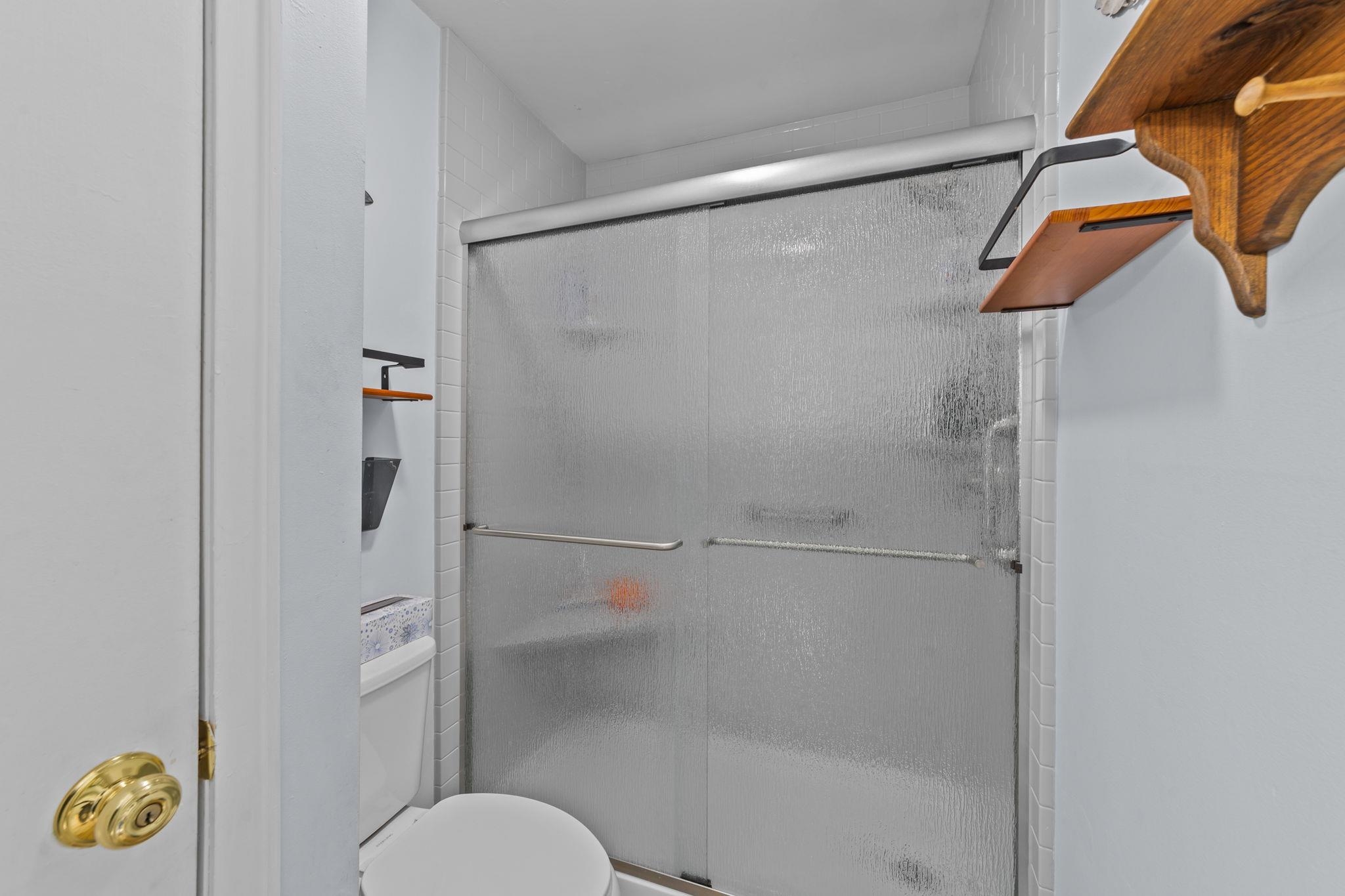 351 Lake Arrowhead Road, Unit 211 Myrtle Beach, SC 29572 - Photo 18 of 40 Full bathroom with toilet and a shower stall