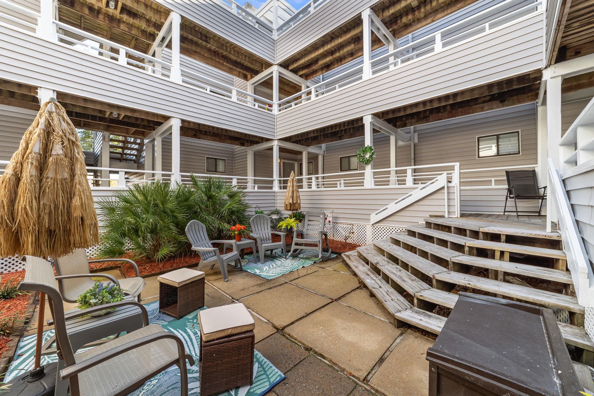 351 Lake Arrowhead Road, Unit 211 Myrtle Beach, SC 29572 - Photo 22 of 40 View of patio with stairs