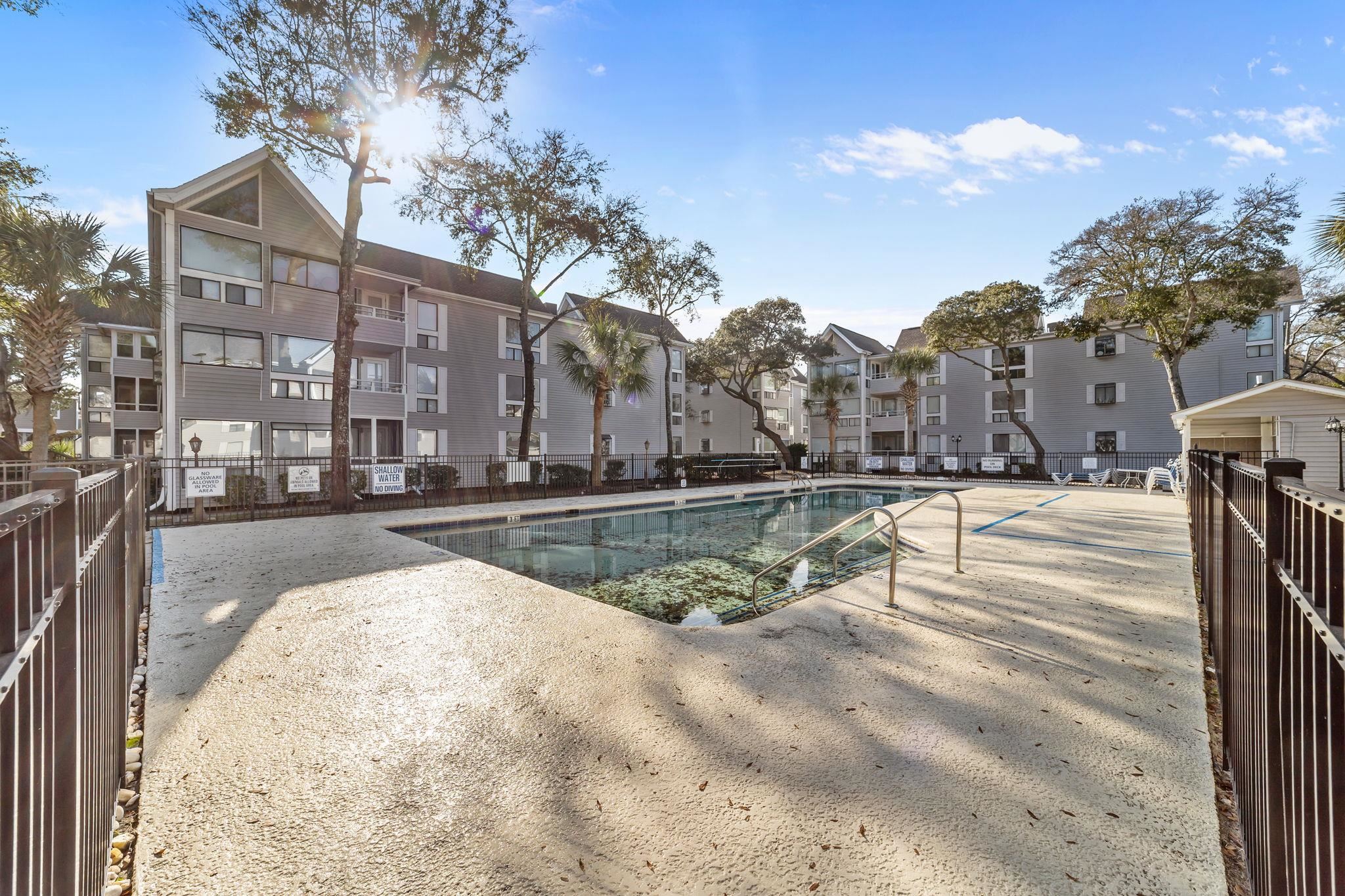 351 Lake Arrowhead Road, Unit 211 Myrtle Beach, SC 29572 - Photo 23 of 40 Community pool featuring a patio