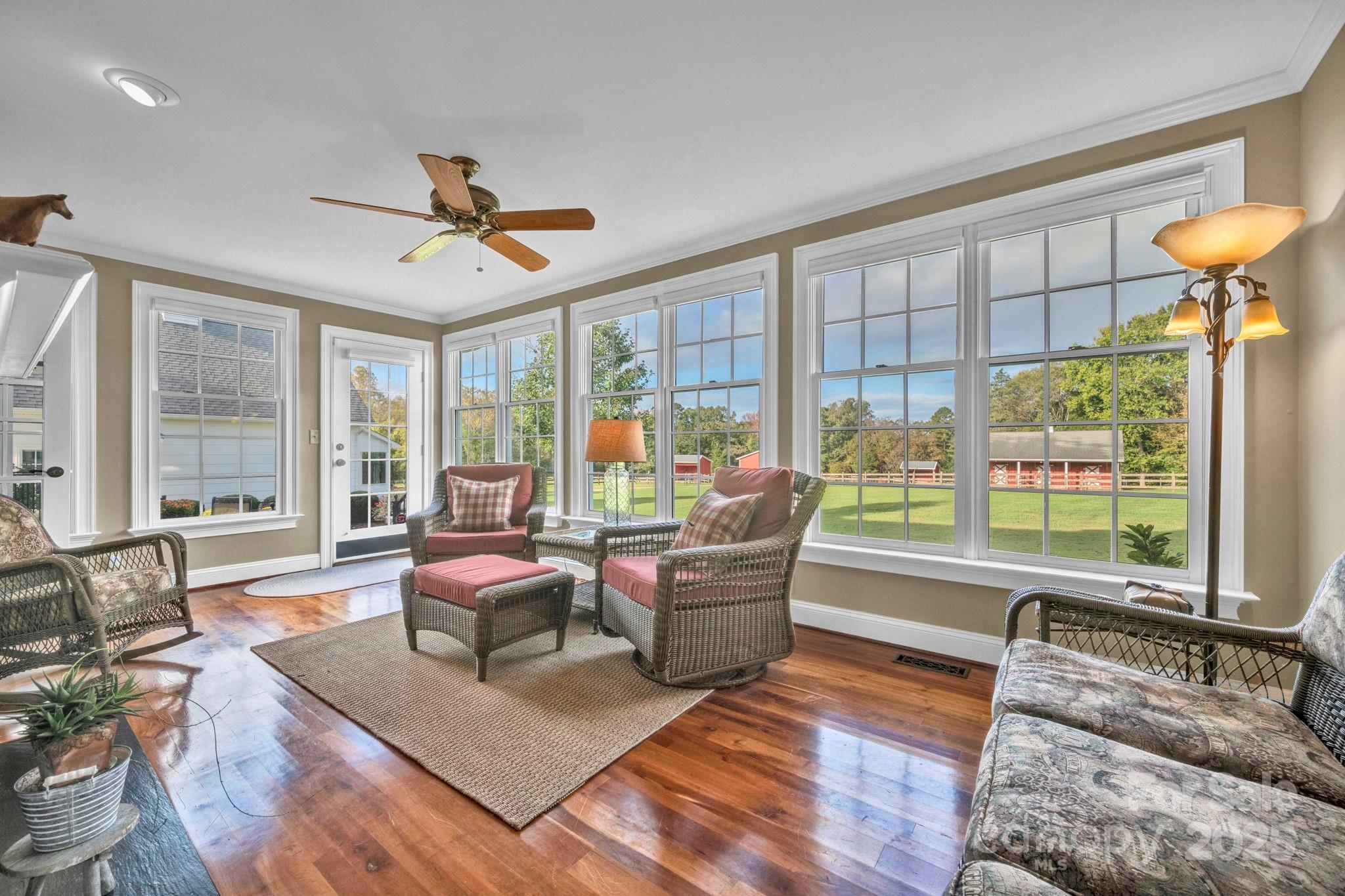 400 Ratledge Road Mocksville, NC 27028 - Photo 15 of 48 a living room with furniture and a large window