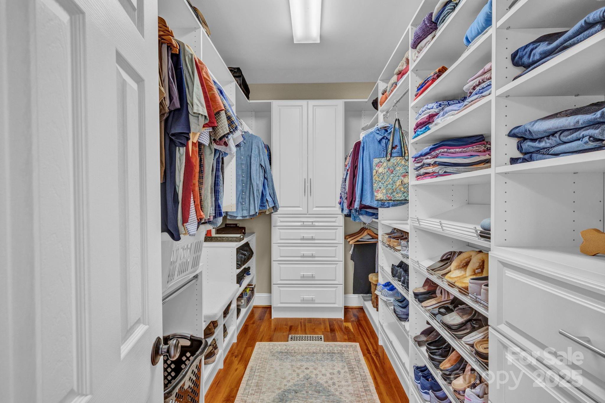 400 Ratledge Road Mocksville, NC 27028 - Photo 18 of 48 a view of walk in closet with clothes and shoes