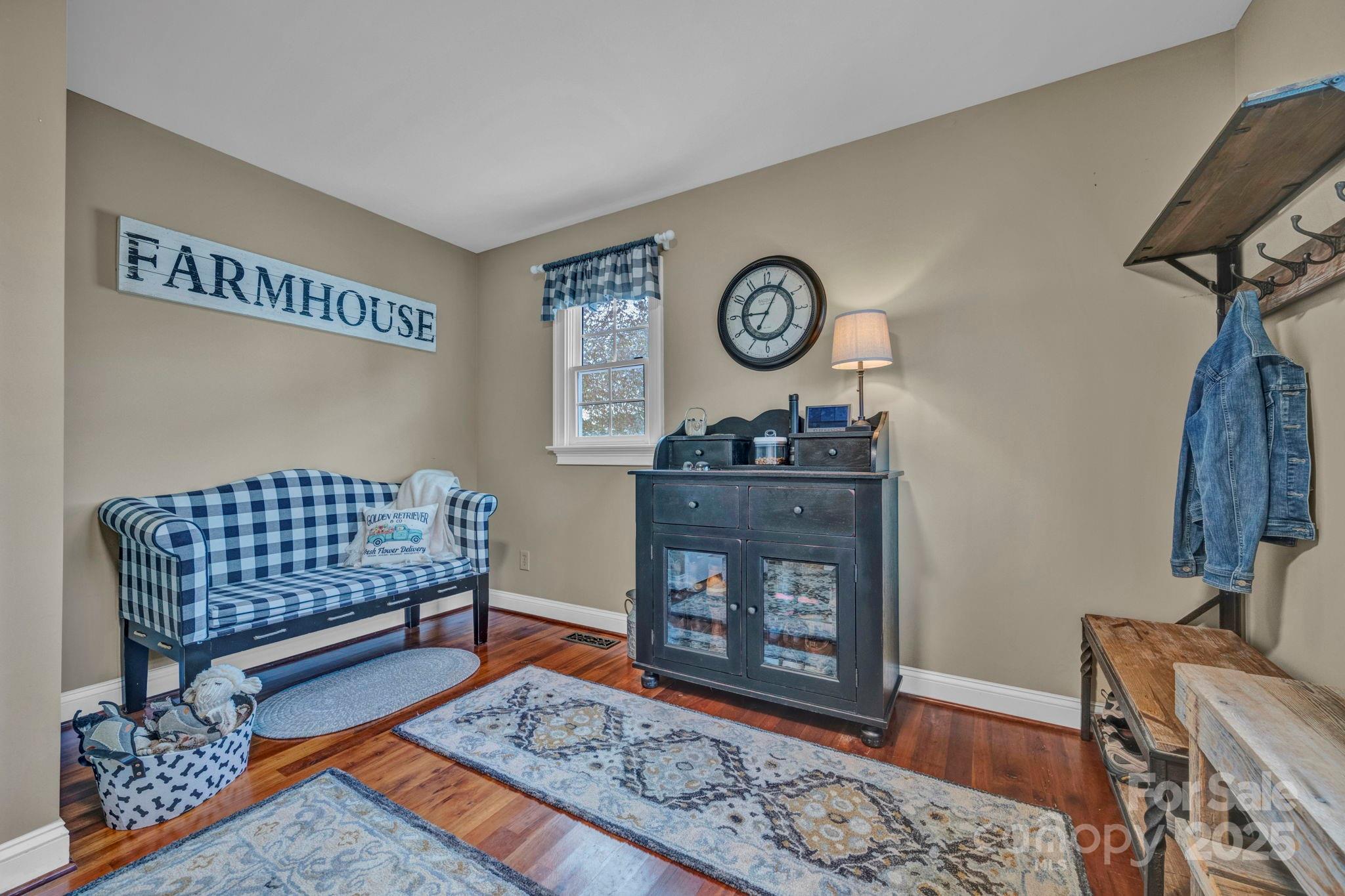 400 Ratledge Road Mocksville, NC 27028 - Photo 19 of 48 a living room with furniture and a wooden floor
