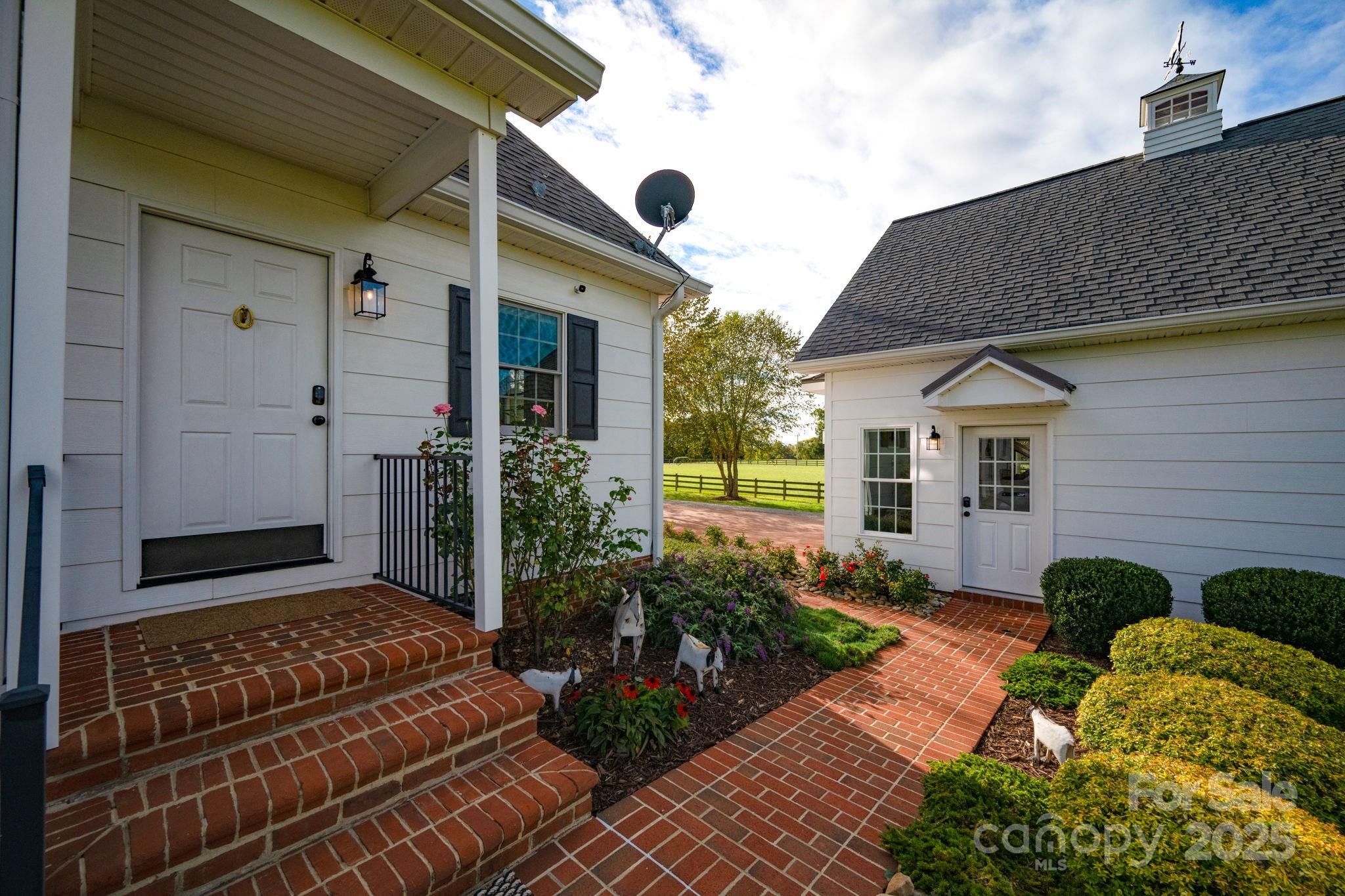 400 Ratledge Road Mocksville, NC 27028 - Photo 20 of 48 a view of house with backyard space and garden