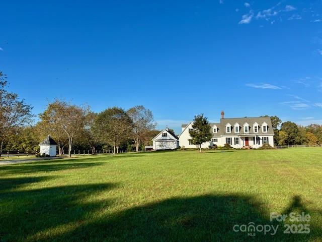 400 Ratledge Road Mocksville, NC 27028 - Photo 2 of 48 a view of a field with an ocean