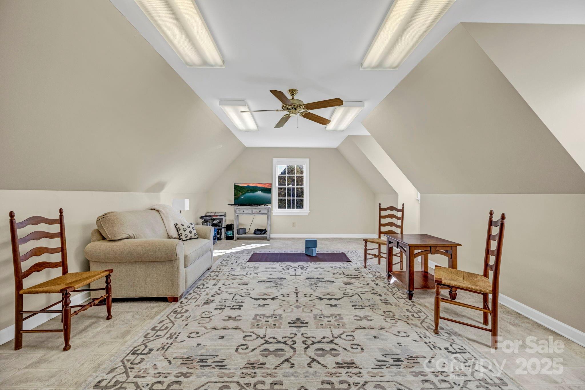 400 Ratledge Road Mocksville, NC 27028 - Photo 24 of 48 a living room with furniture a rug and a window
