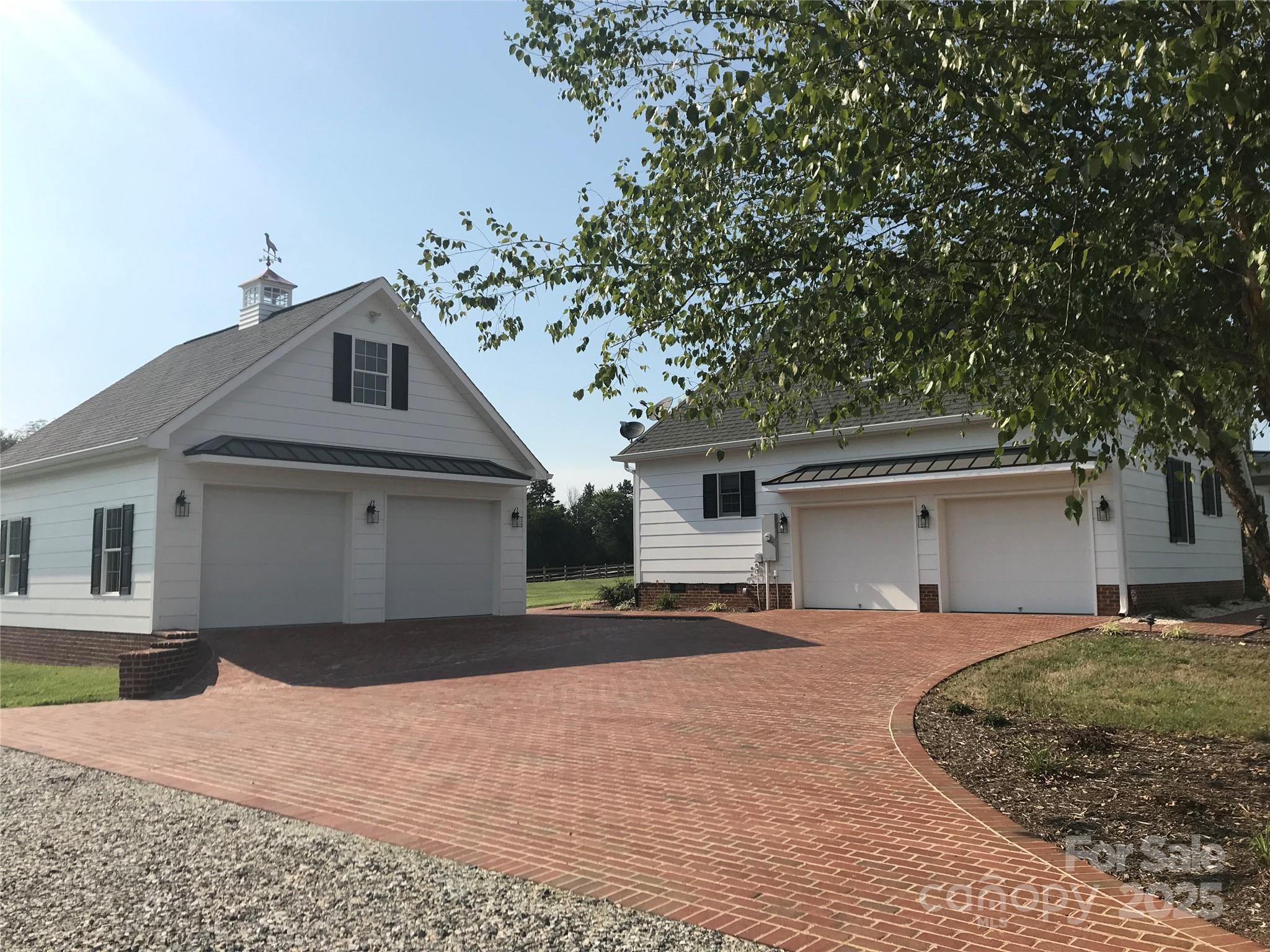 400 Ratledge Road Mocksville, NC 27028 - Photo 27 of 48 a front view of a house with a yard and garage