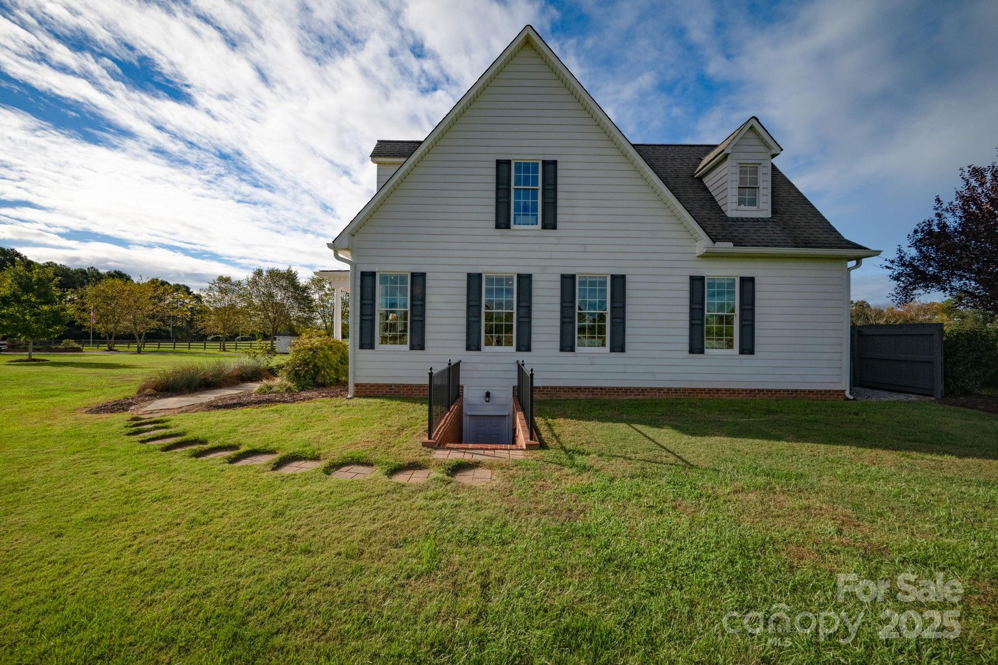 400 Ratledge Road Mocksville, NC 27028 - Photo 28 of 48 a view of a house with backyard and porch