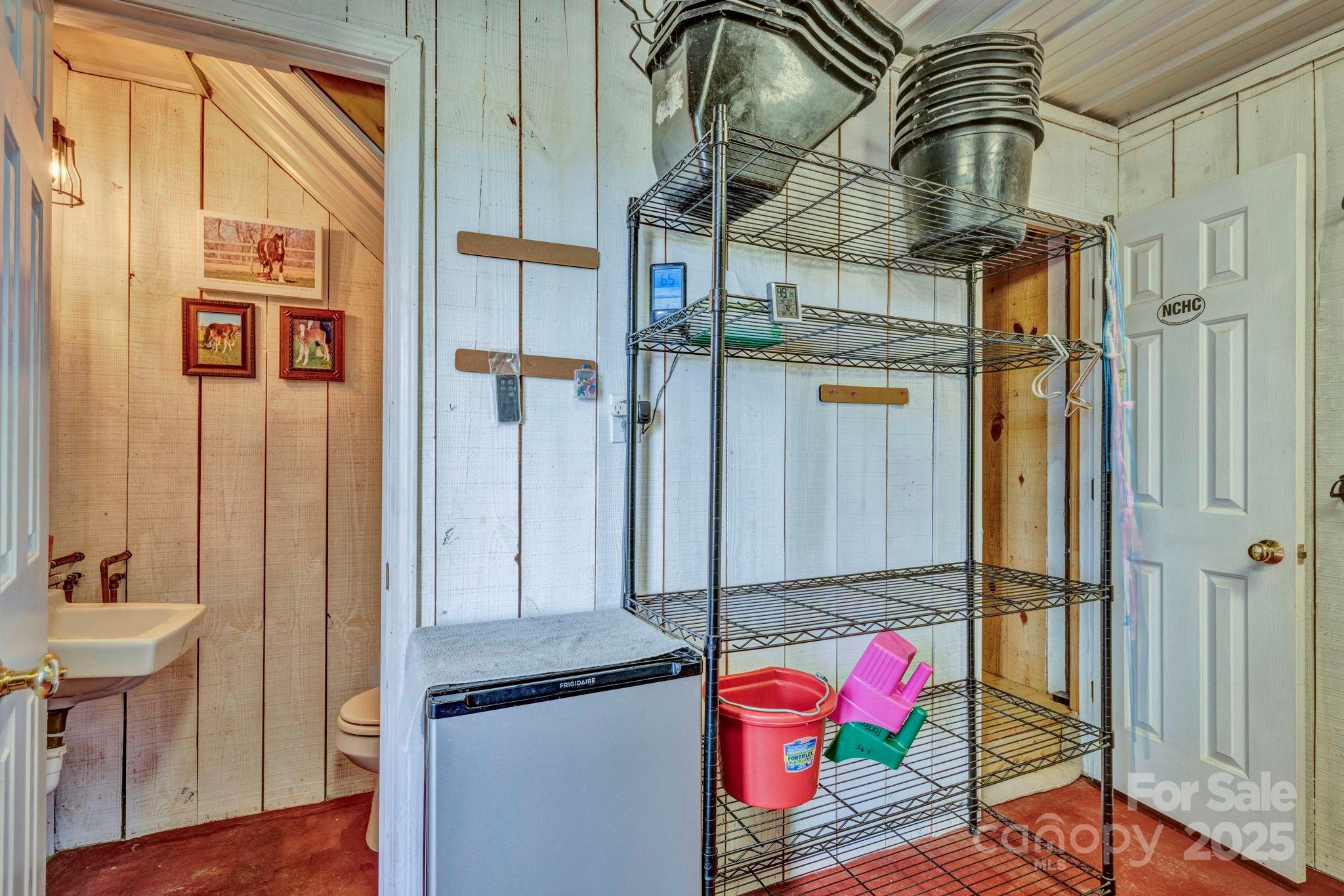 400 Ratledge Road Mocksville, NC 27028 - Photo 35 of 48 a bathroom with a granite countertop shower a mirror and a sink