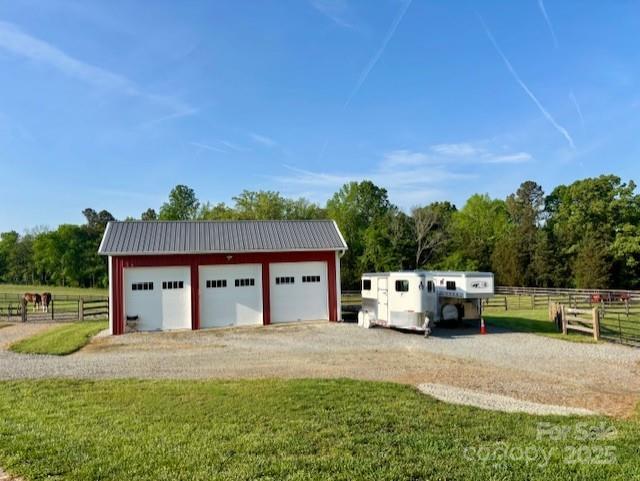 400 Ratledge Road Mocksville, NC 27028 - Photo 39 of 48 a house view with a garden space