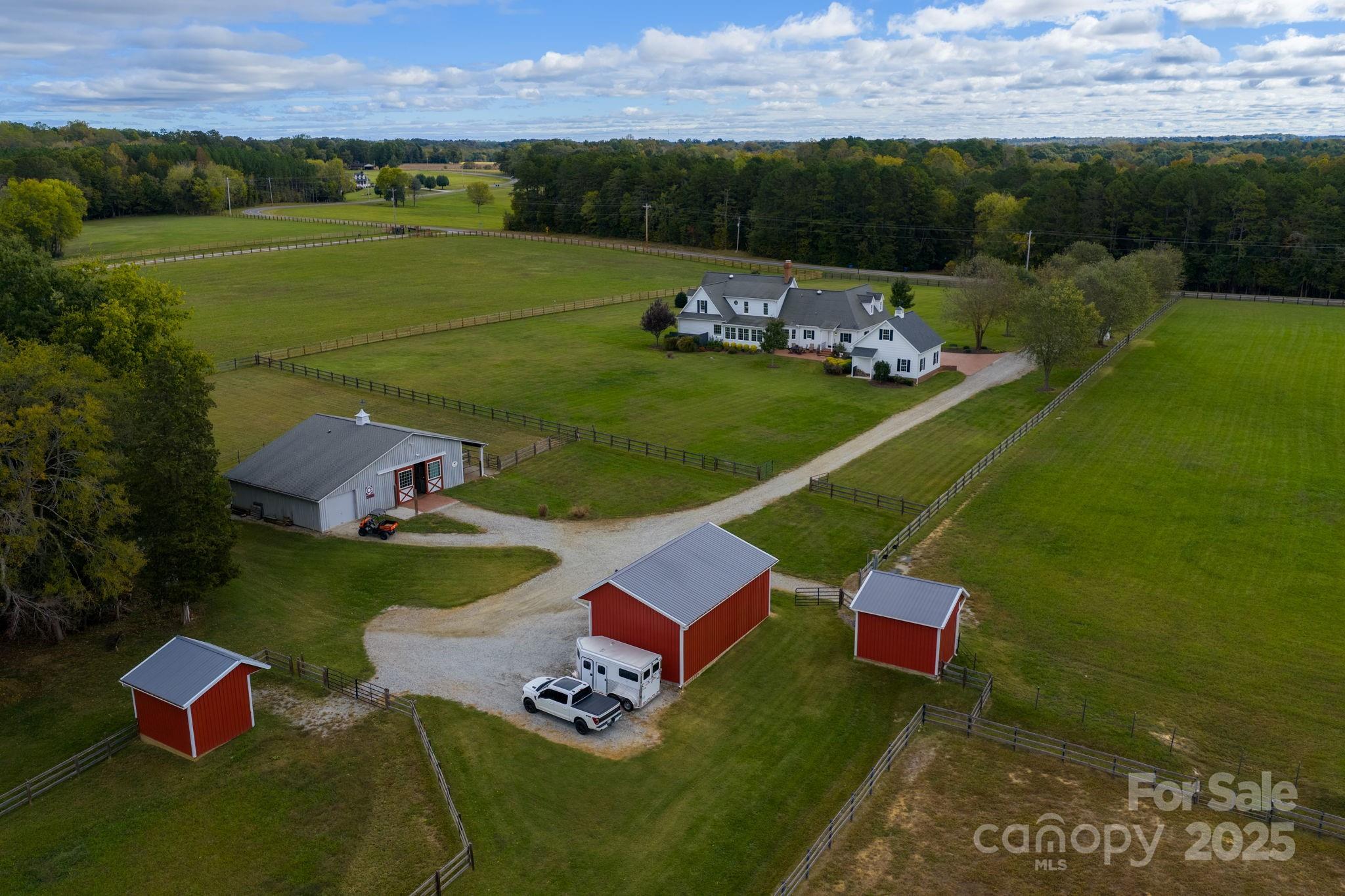400 Ratledge Road Mocksville, NC 27028 - Photo 4 of 48 an aerial view of a house with a garden
