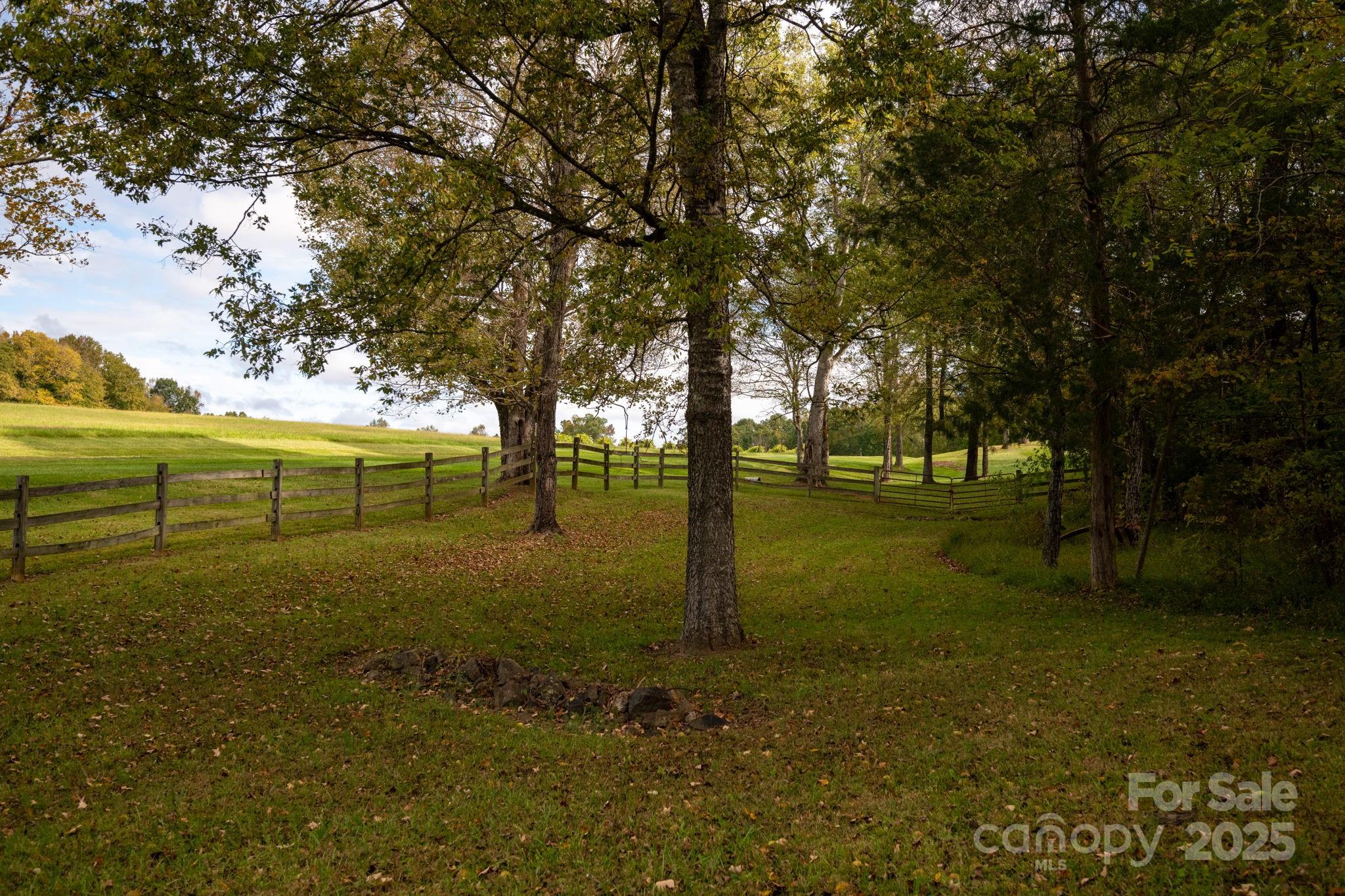 400 Ratledge Road Mocksville, NC 27028 - Photo 45 of 48 a view of a field with trees